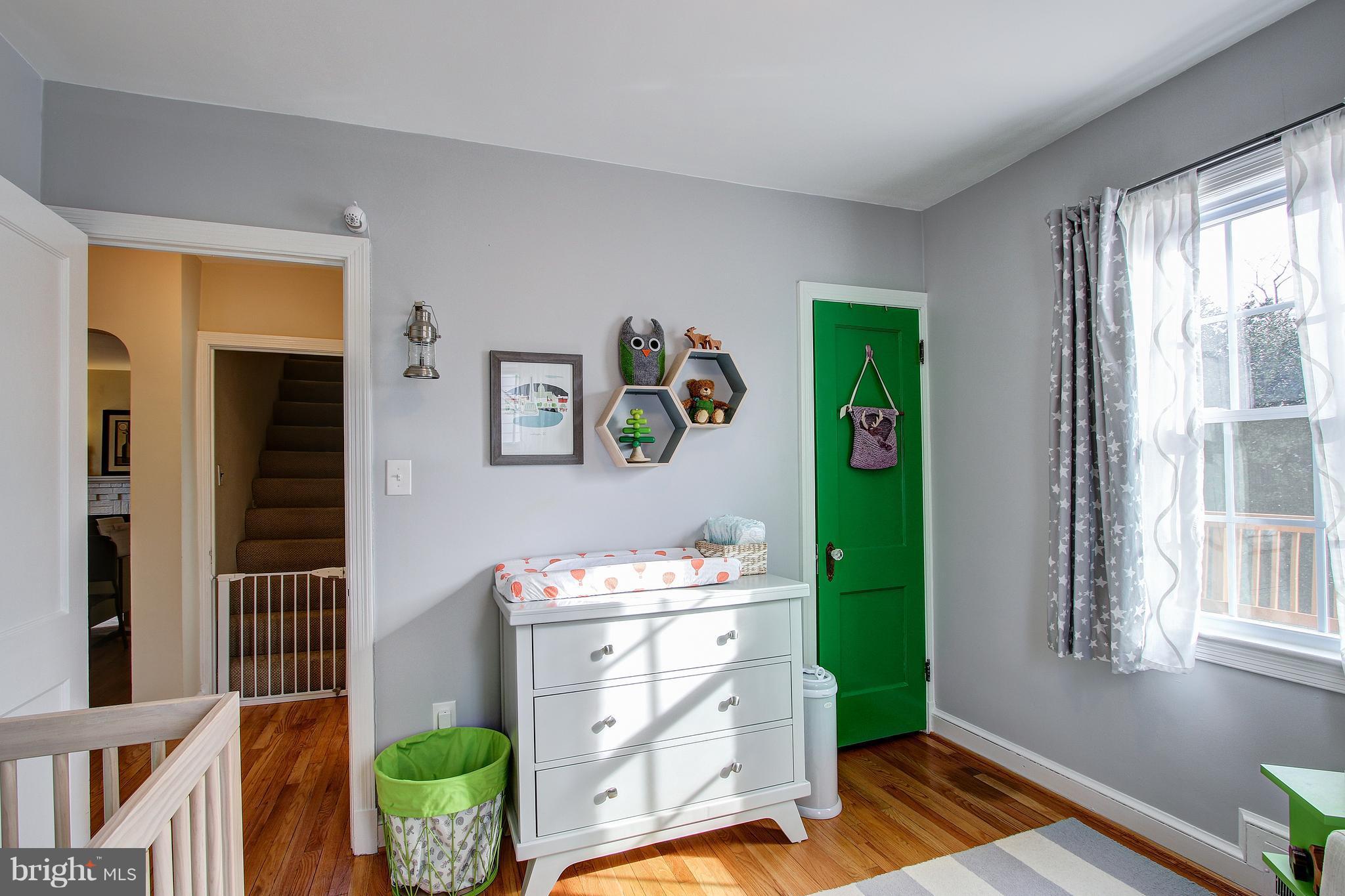9929 Markham Street Silver Spring, MD 20901 - Photo 14 of 29 a room with a bed and a window