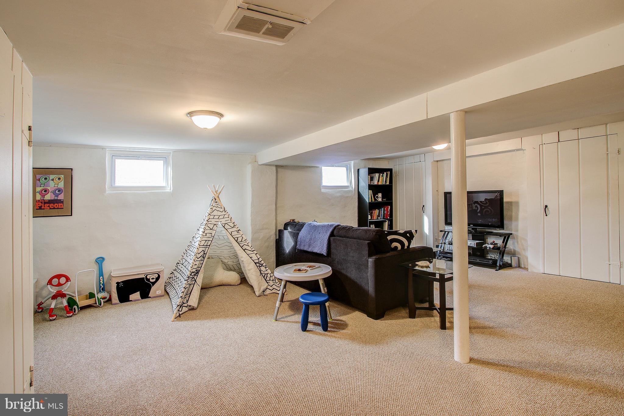 9929 Markham Street Silver Spring, MD 20901 - Photo 21 of 29 a view of a room with gym equipment