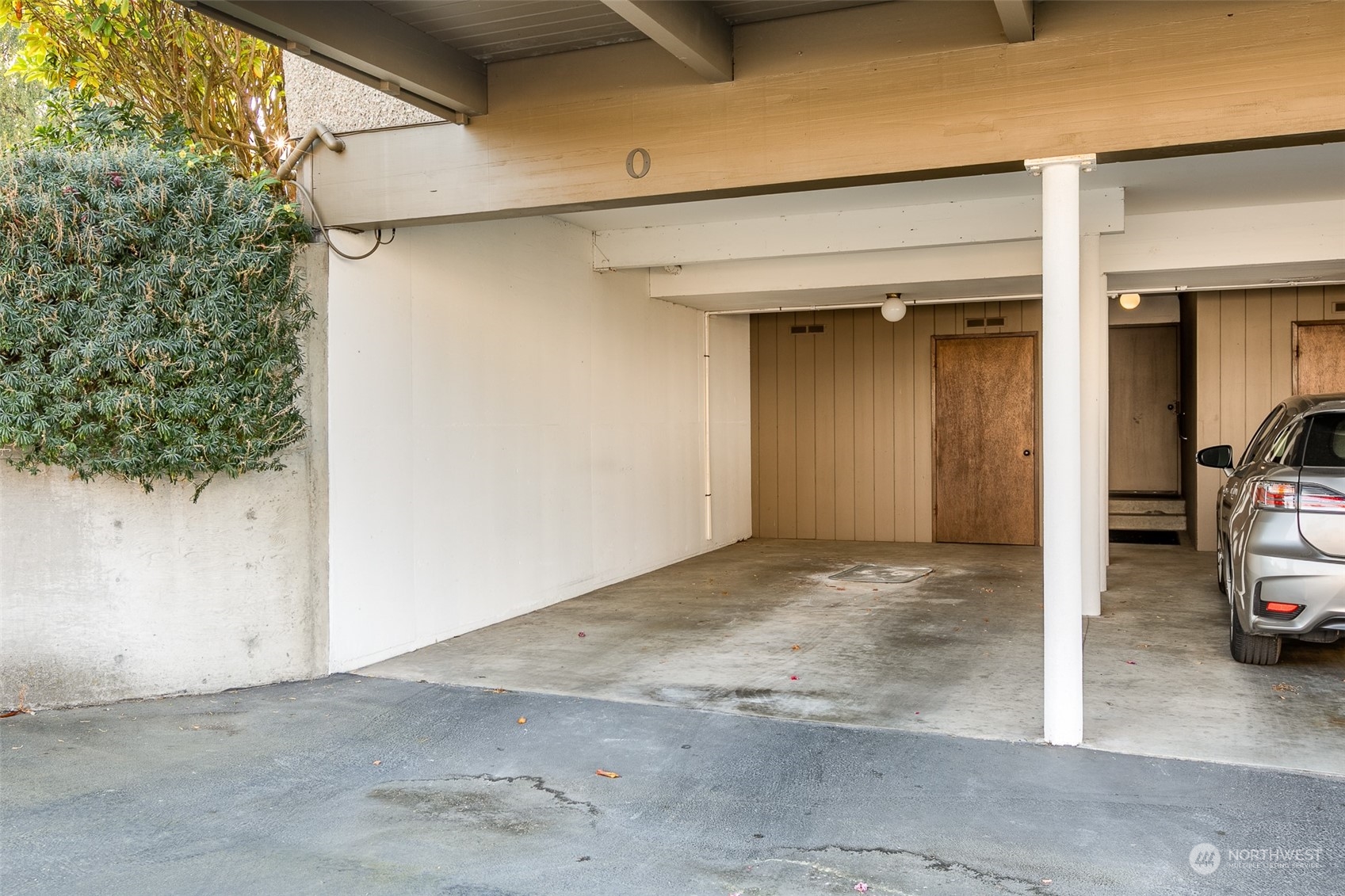 655 Main Street, Unit 301 Edmonds, WA 98020 - Photo 21 of 28 a view of a car garage door