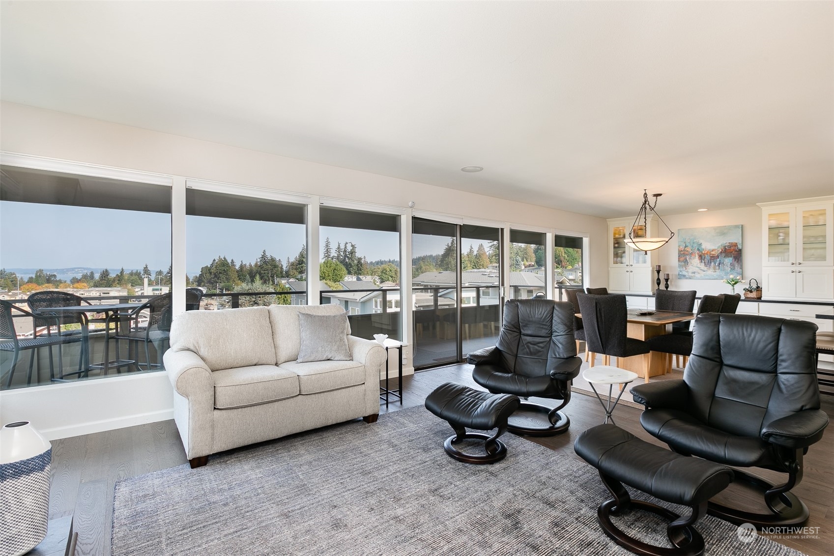 655 Main Street, Unit 301 Edmonds, WA 98020 - Photo 9 of 28 a living room with furniture and a large window