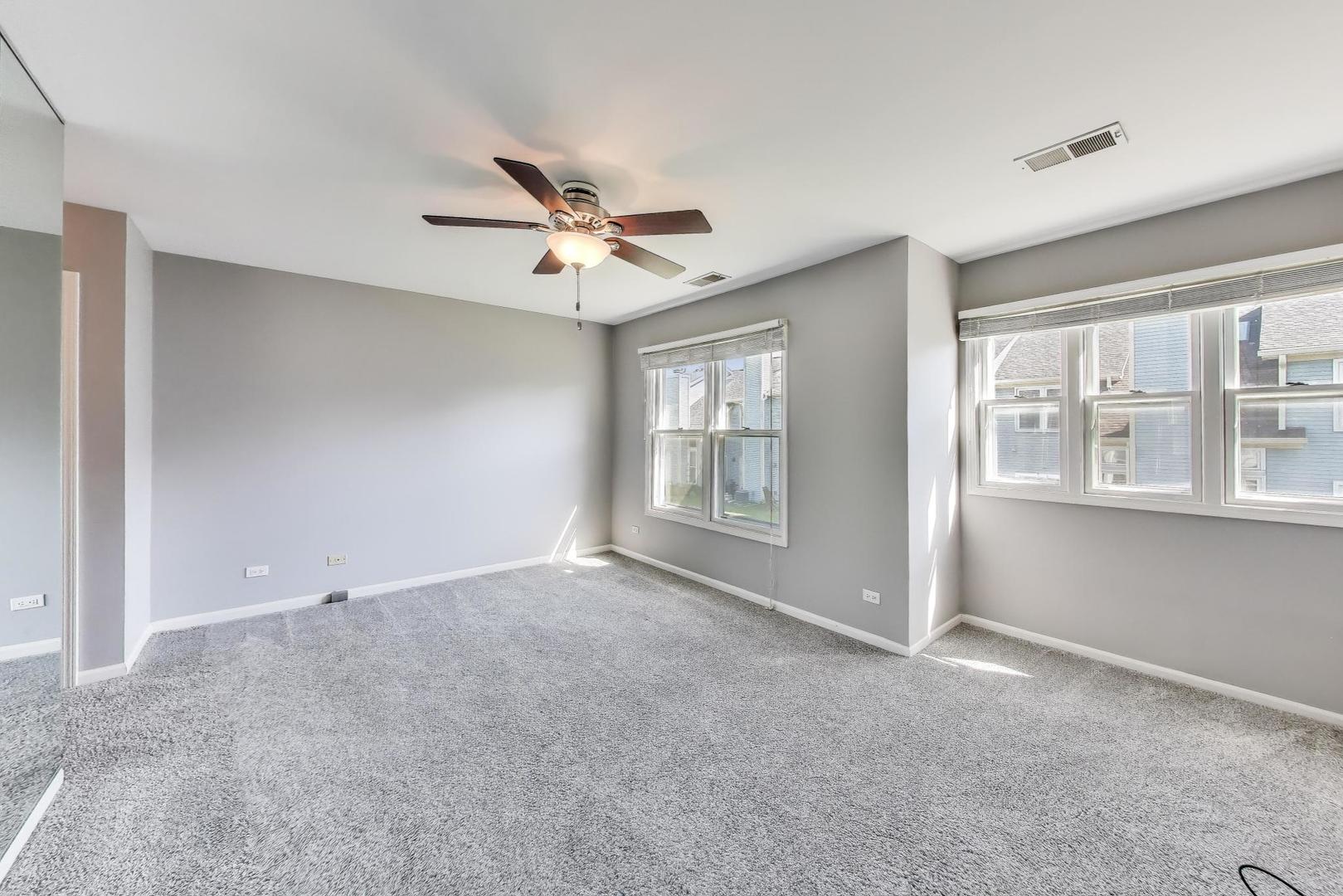 914 Prospect Court, Unit 914 Naperville, IL 60540 - Photo 16 of 38 a view of an empty room with a window