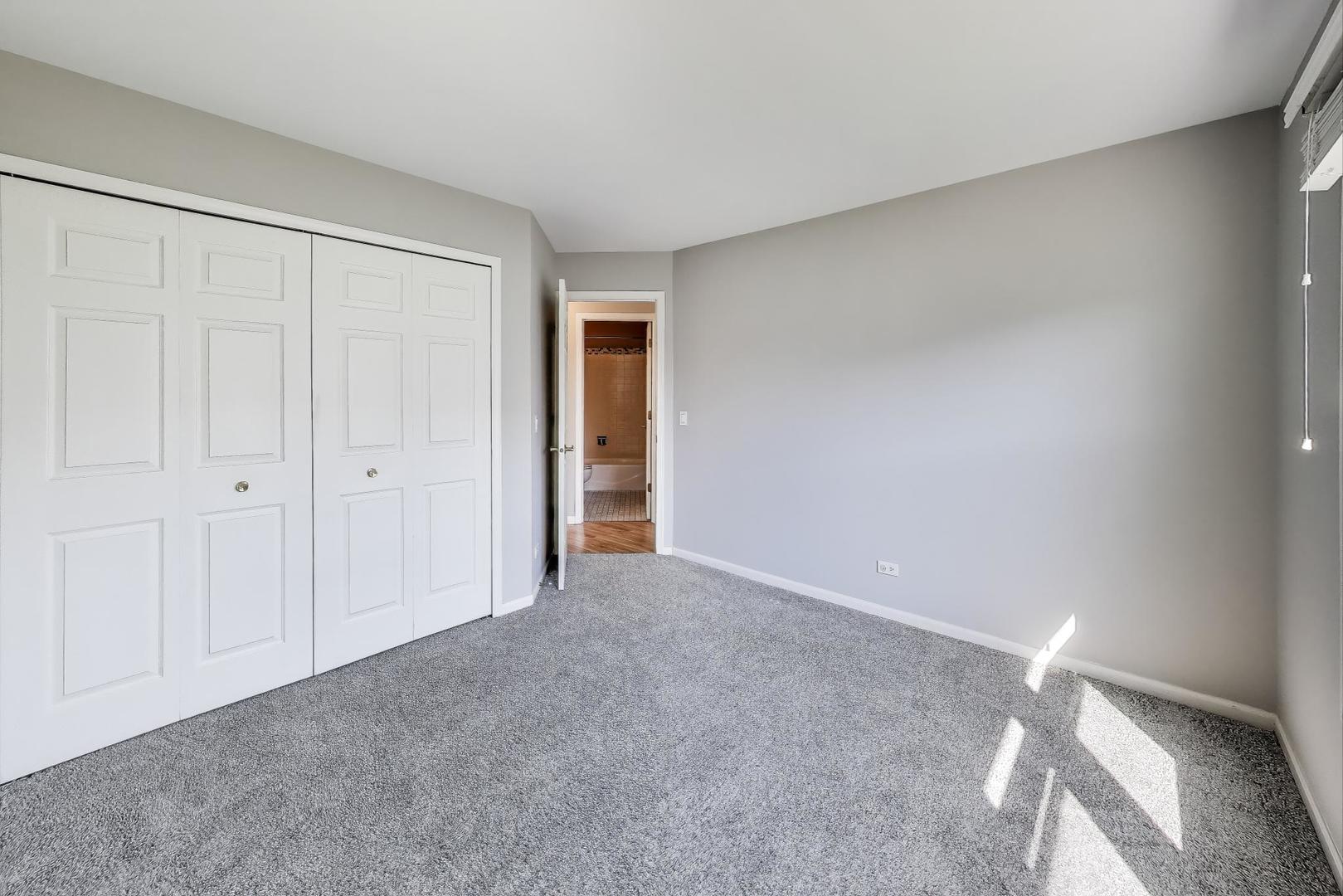914 Prospect Court, Unit 914 Naperville, IL 60540 - Photo 23 of 38 a view of an empty room and closet area