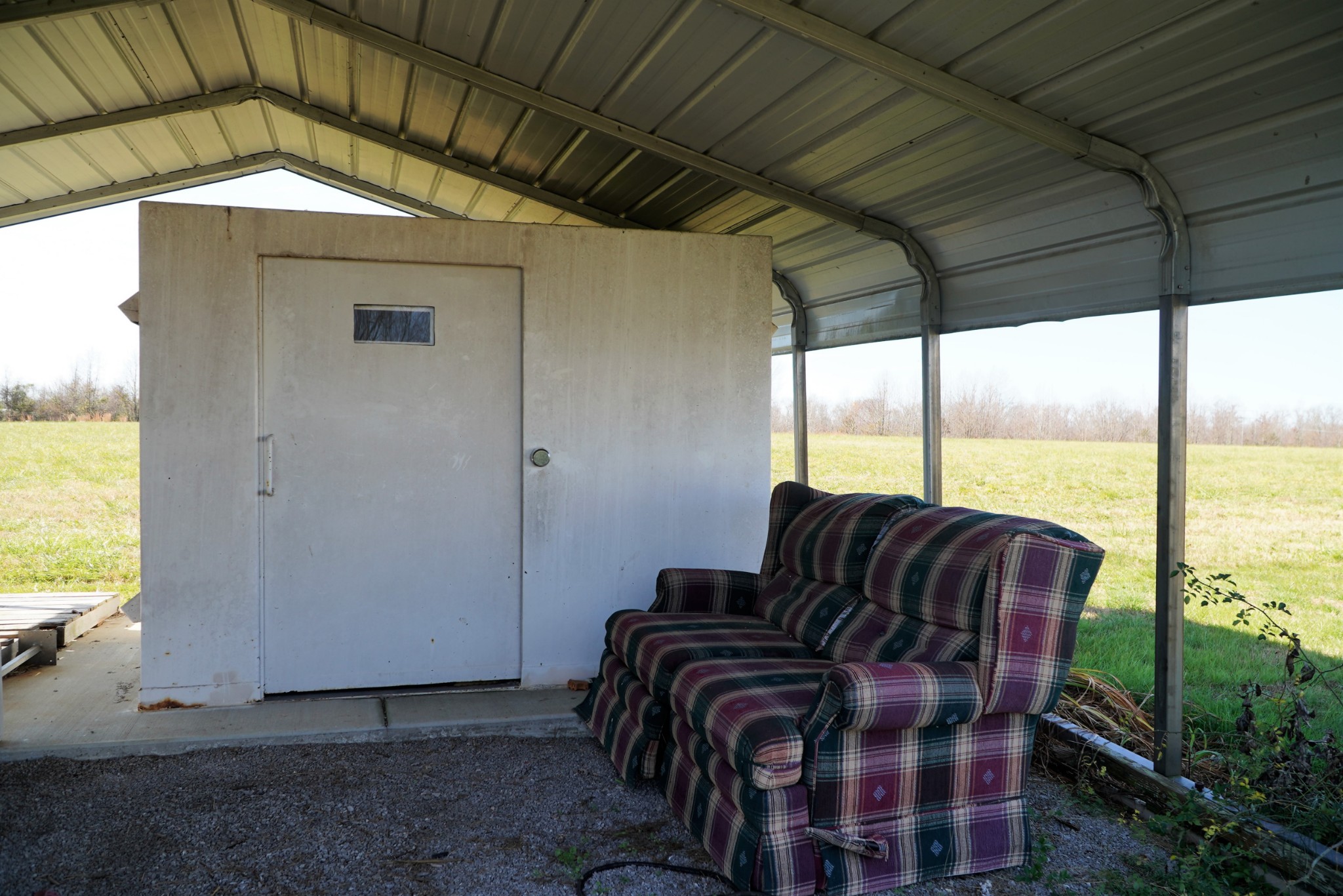 680 Howell Hill Road Flintville, TN 37335 - Photo 24 of 48 a roof deck with table and chairs under an umbrella