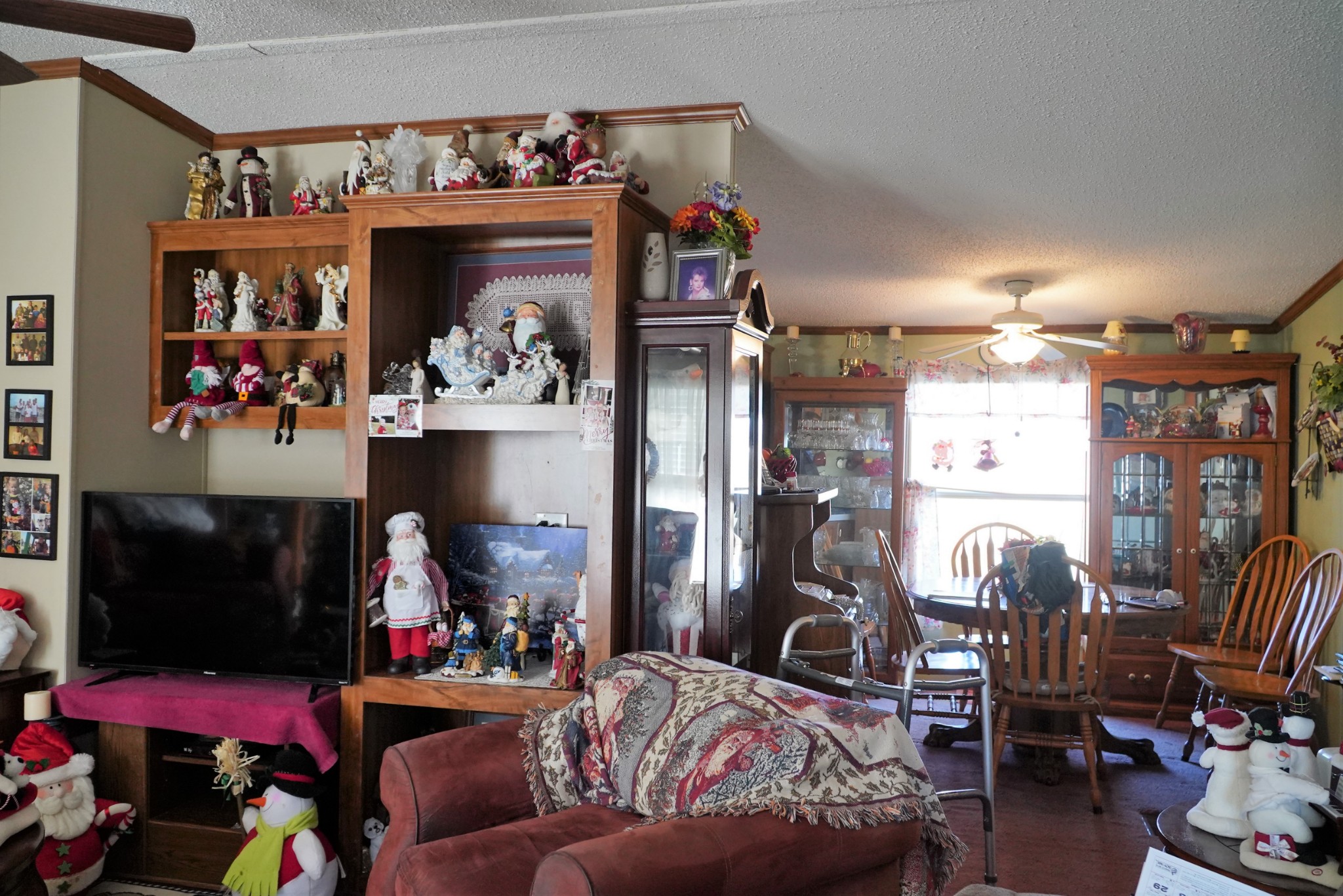 680 Howell Hill Road Flintville, TN 37335 - Photo 5 of 48 a living room with lots of furniture and a chandelier