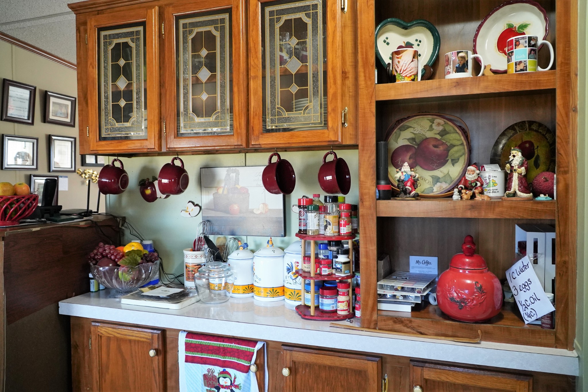 680 Howell Hill Road Flintville, TN 37335 - Photo 7 of 48 a kitchen filled with lots of clutter and cabinets