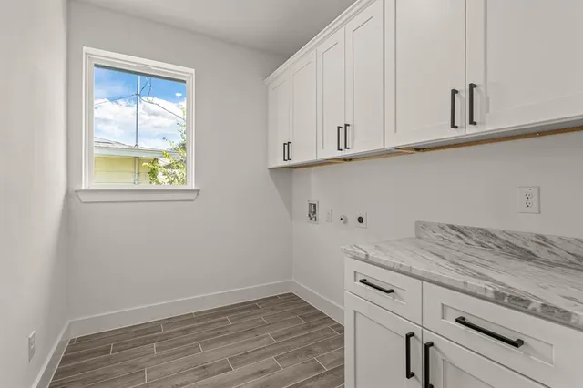 a view of cabinets and window