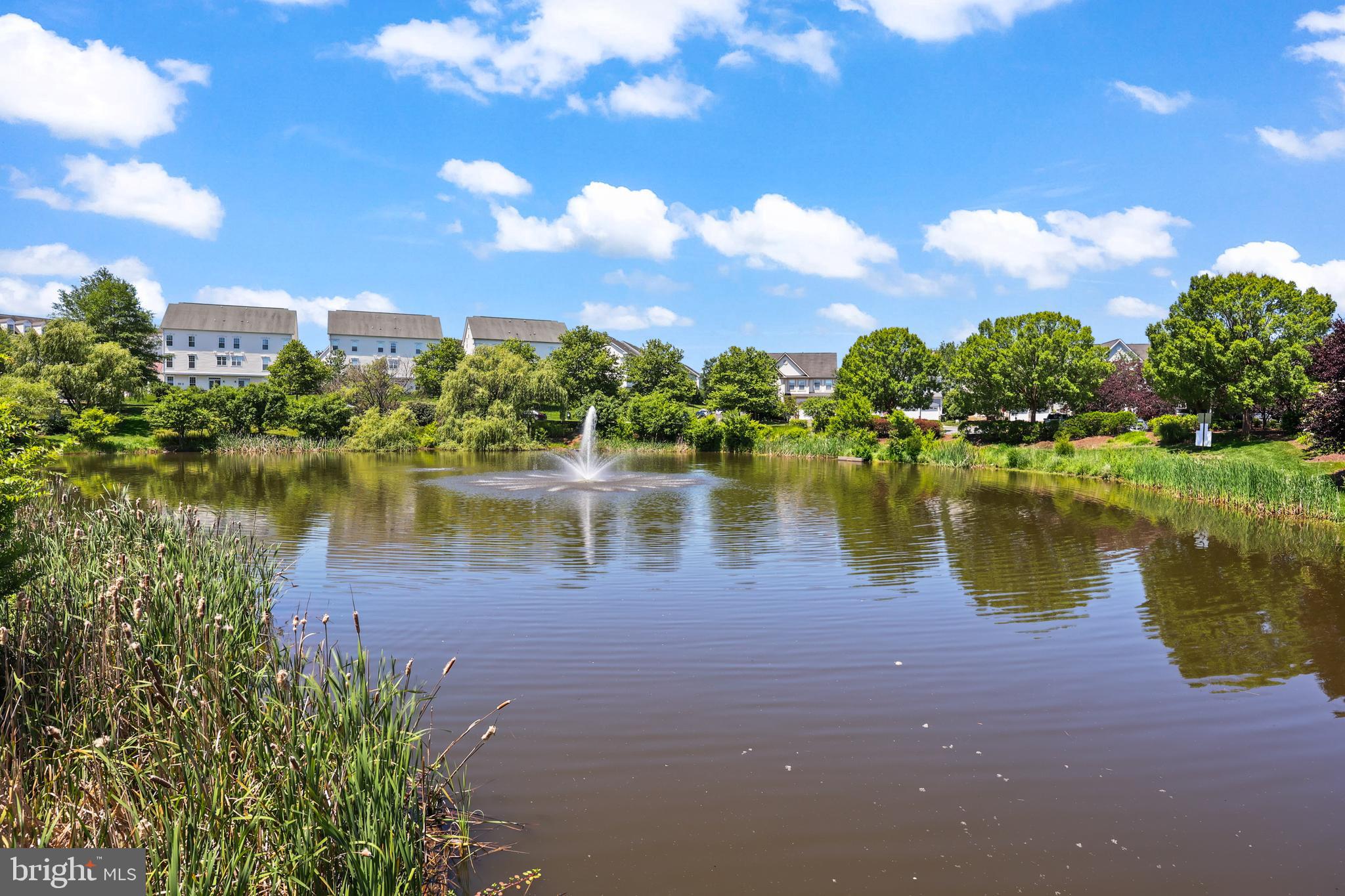 6806 Witton Circle Gainesville, VA 20155 - Photo 46 of 47 a view of a lake with houses in the background