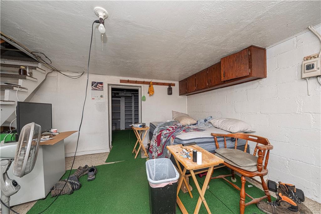 7300 Hutchinson Road Elizabeth, PA 15037 - Photo 35 of 42 This area of the basement can be used for games or storage.