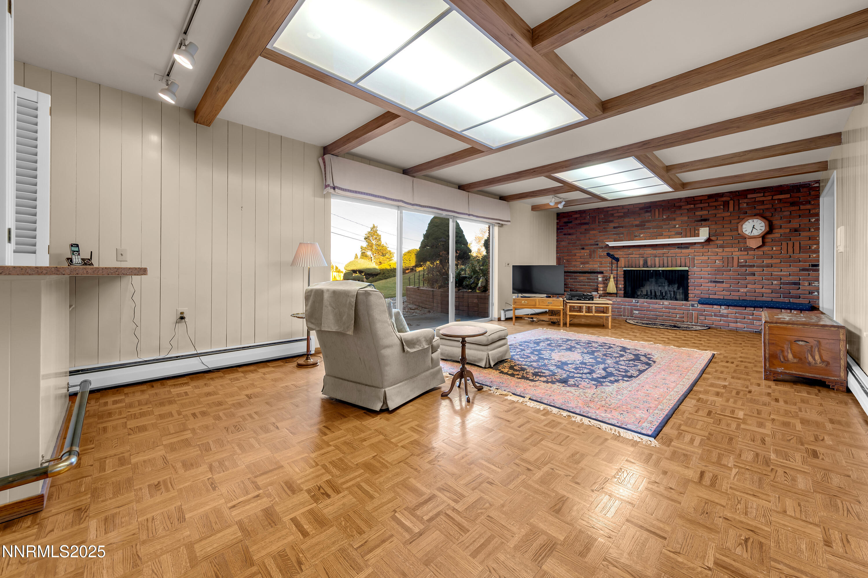 1965 Solari Drive Reno, NV 89509 - Photo 20 of 44 a living room with patio furniture and a fireplace