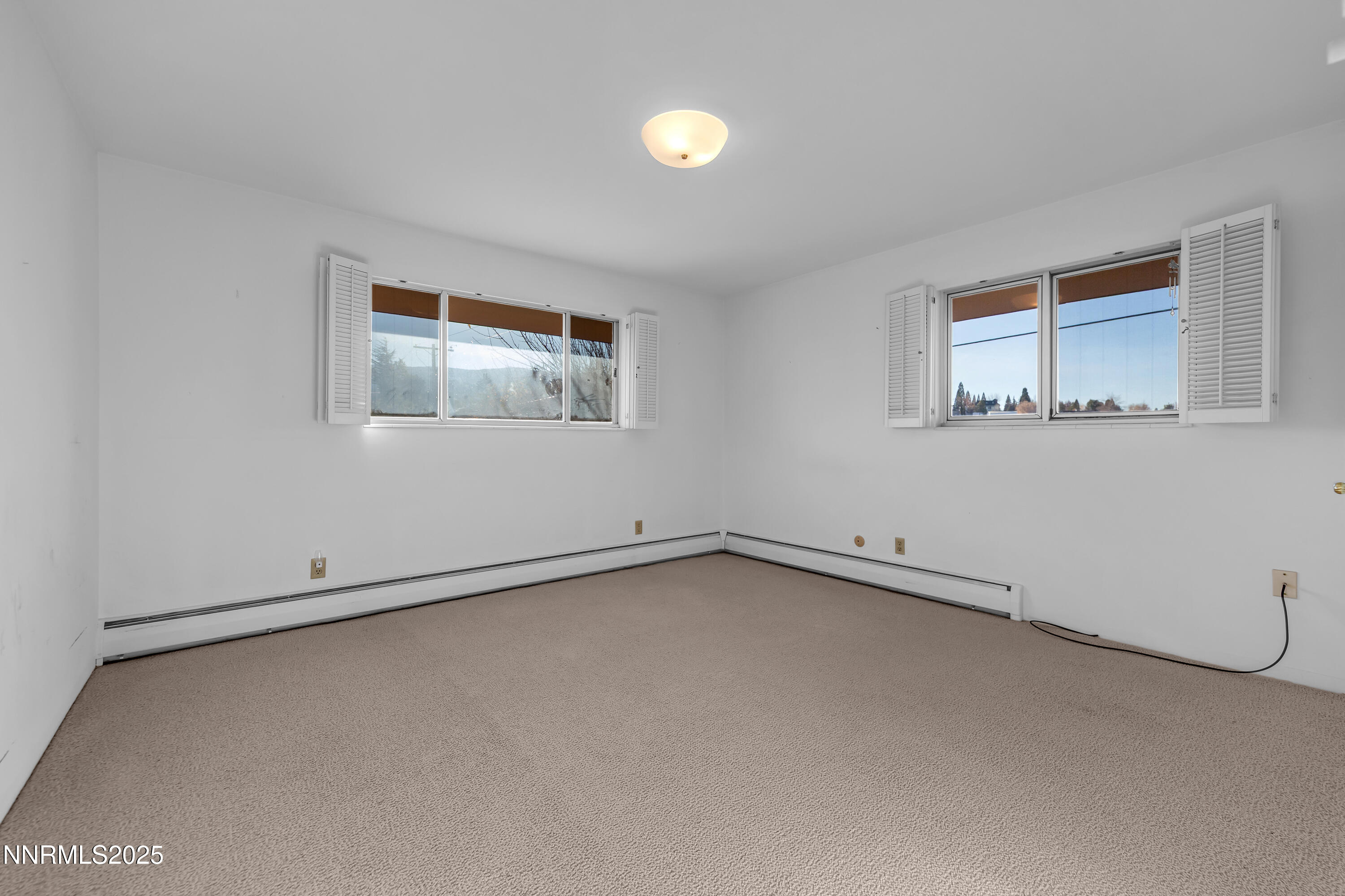 1965 Solari Drive Reno, NV 89509 - Photo 27 of 44 a view of an empty room with a window