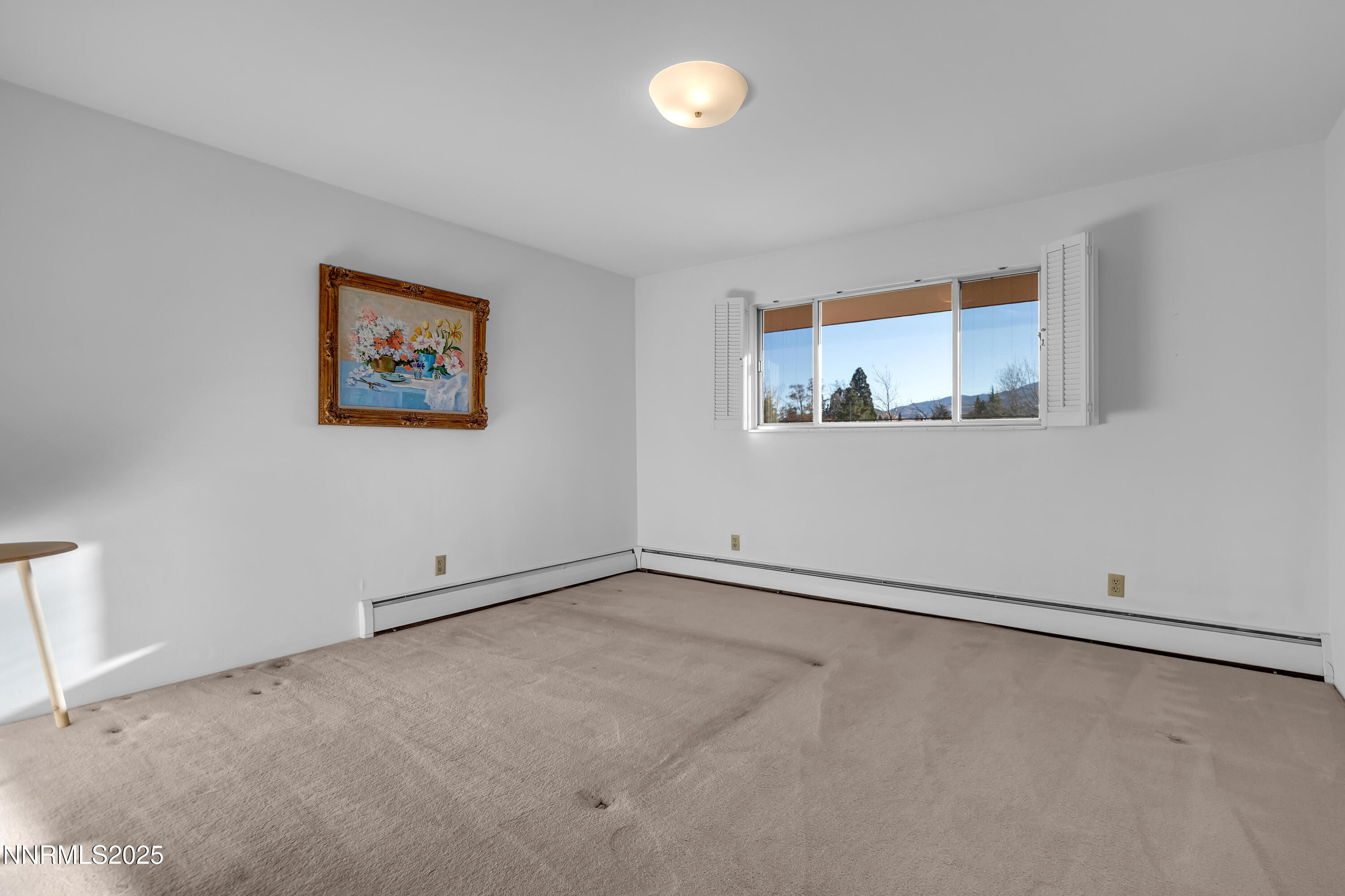 1965 Solari Drive Reno, NV 89509 - Photo 28 of 44 a view of an empty room with a window