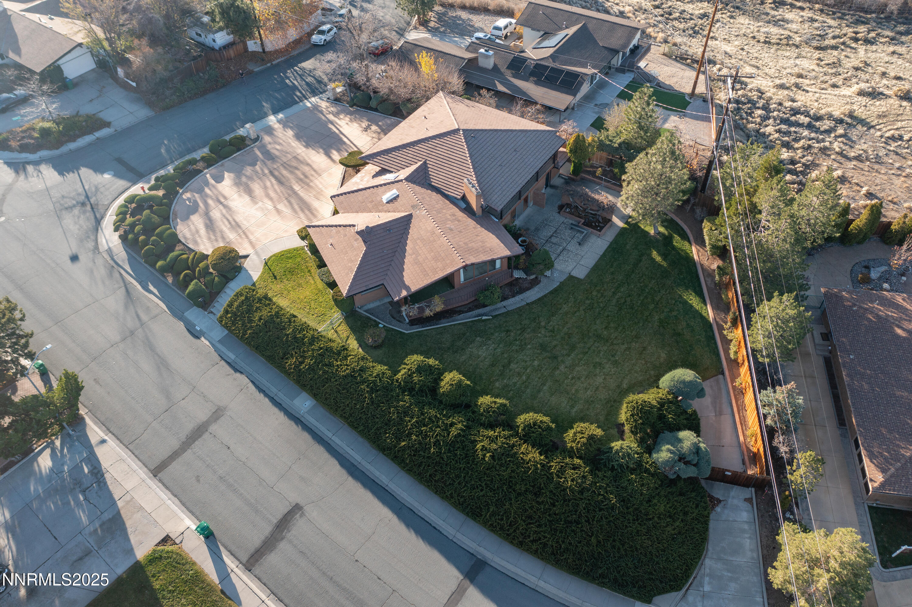 1965 Solari Drive Reno, NV 89509 - Photo 42 of 44 an aerial view of a house with a garden and plants