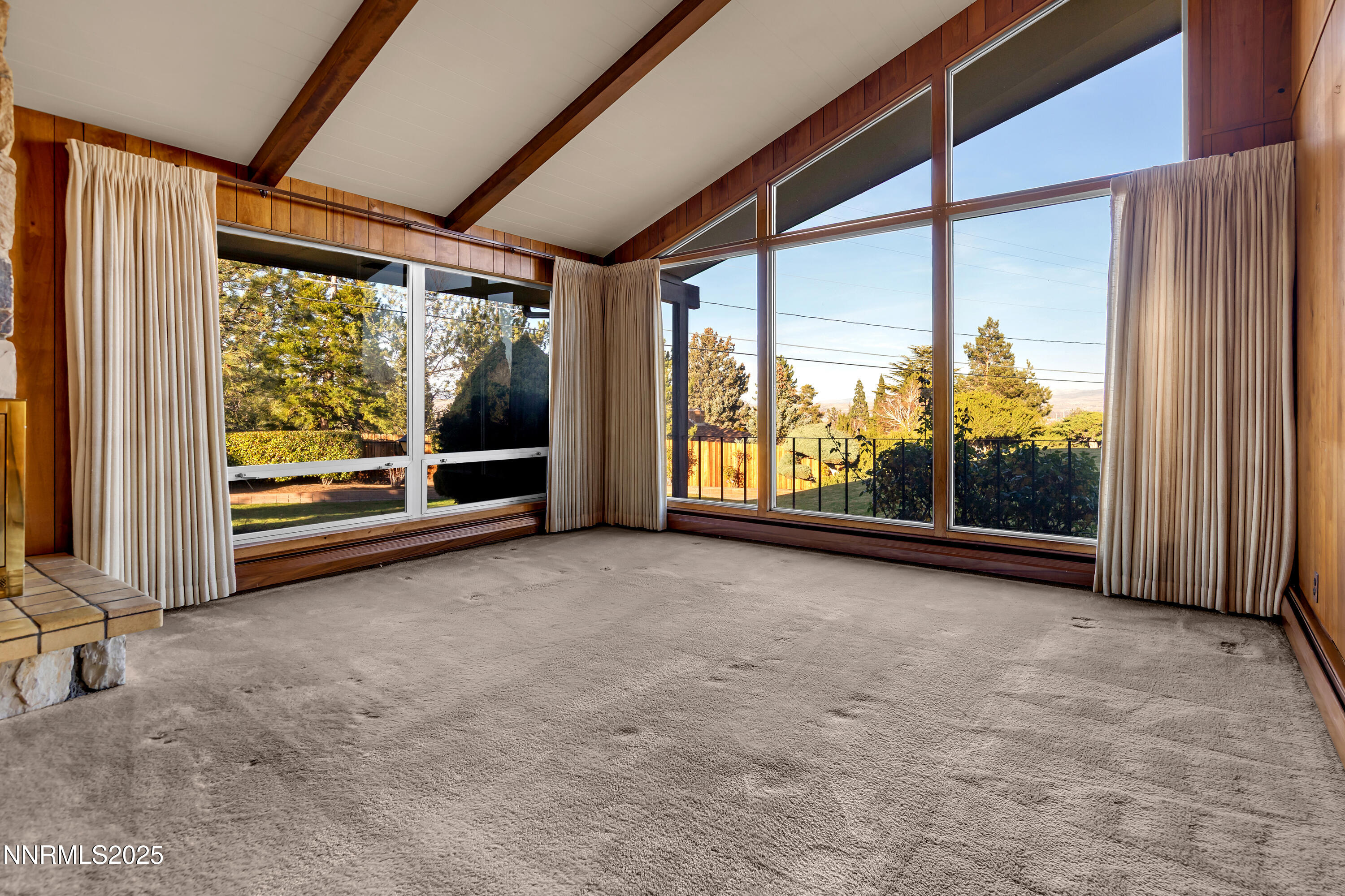 1965 Solari Drive Reno, NV 89509 - Photo 7 of 44 an empty room with large windows