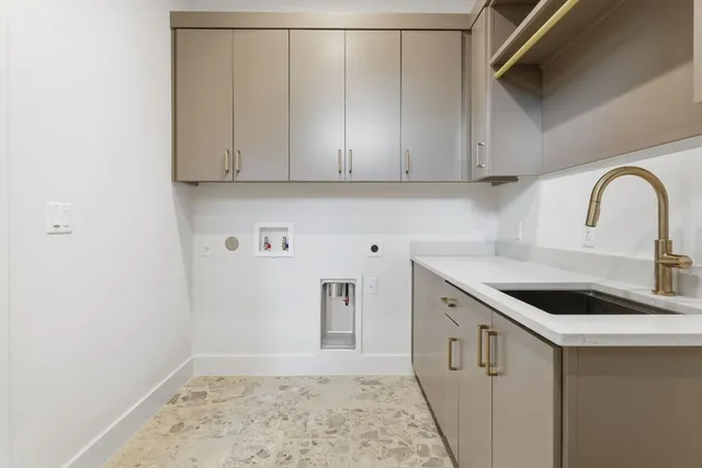 a kitchen with a table and chairs in it