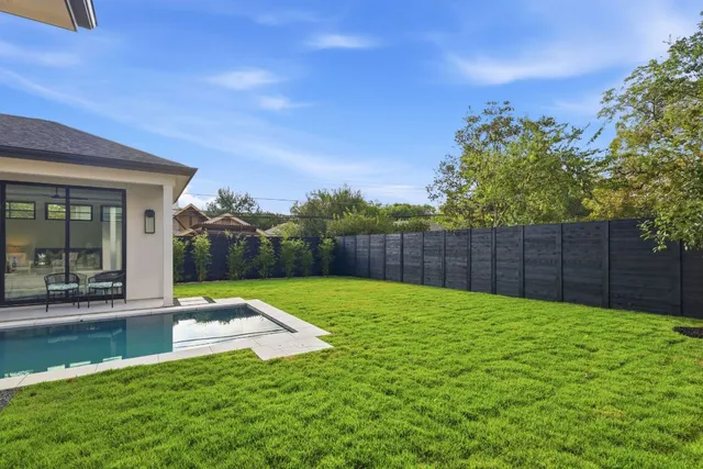 swimming pool with outdoor seating