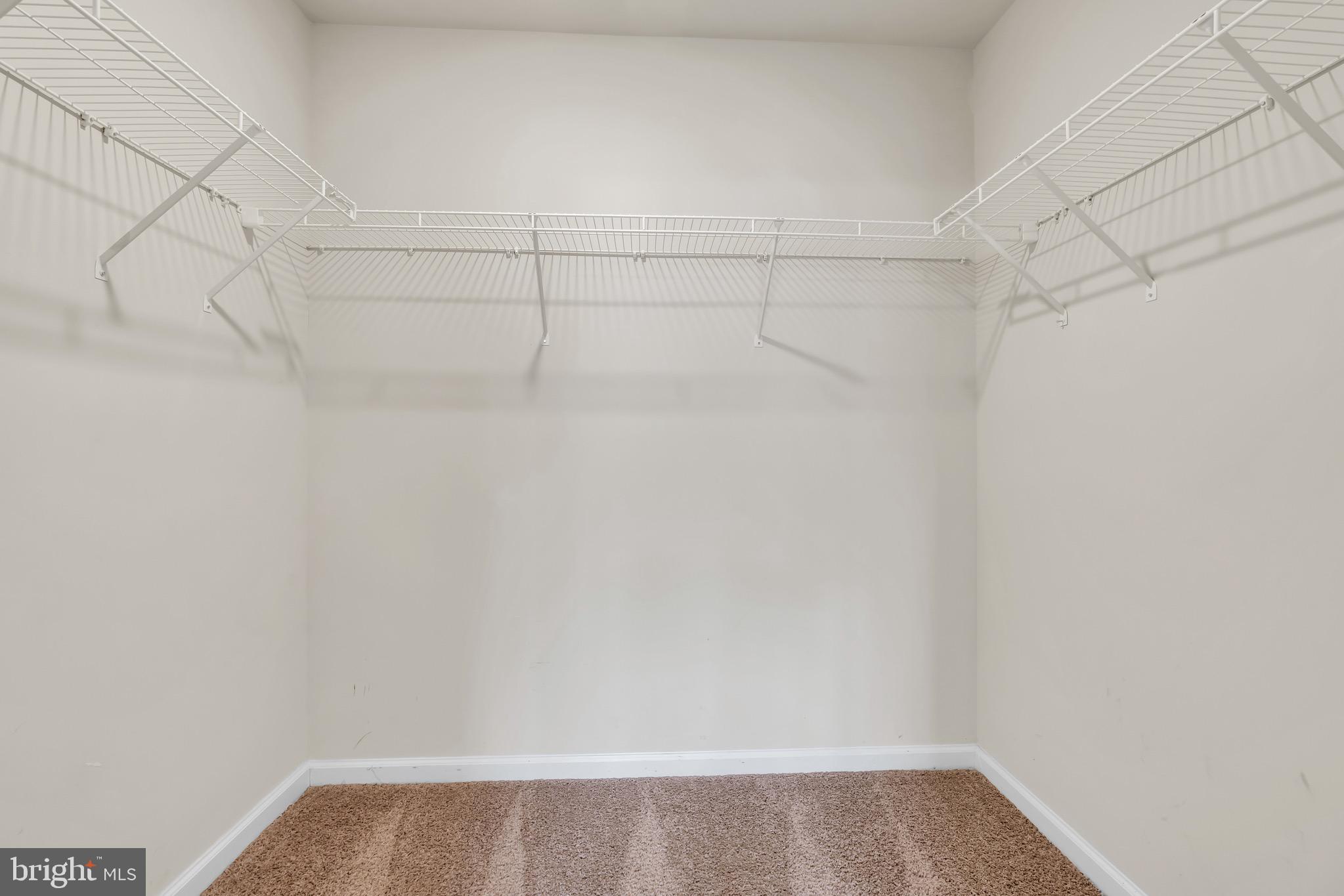 504 East International Road Monroe Township, NJ 08831 - Photo 20 of 37 a view of a room with racks on the wall