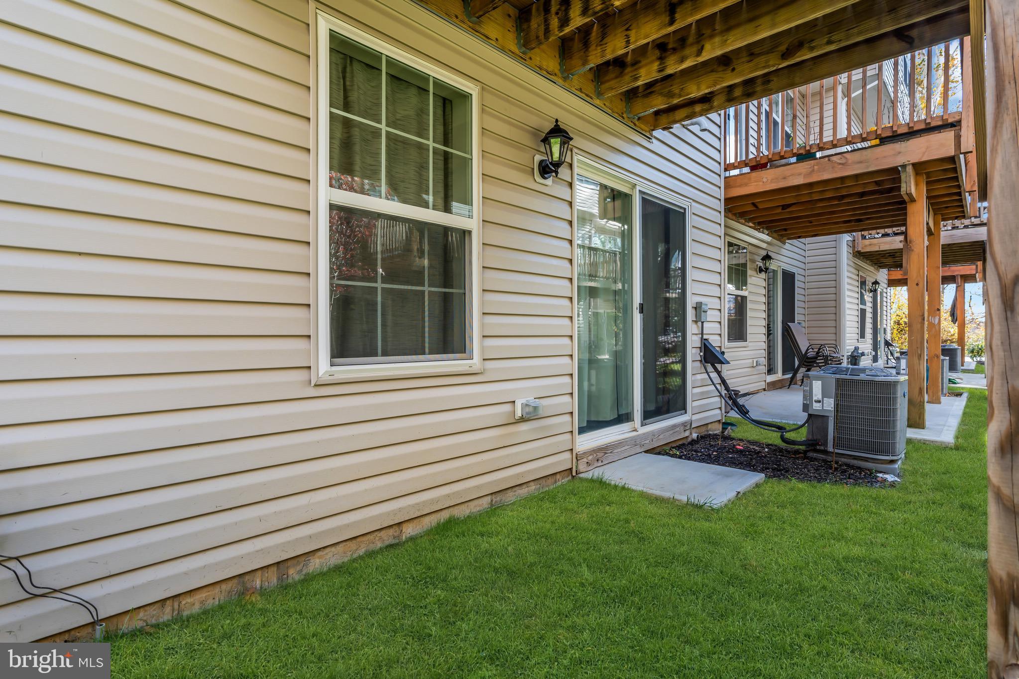 504 East International Road Monroe Township, NJ 08831 - Photo 30 of 37 a view of backyard with a deck and a garden