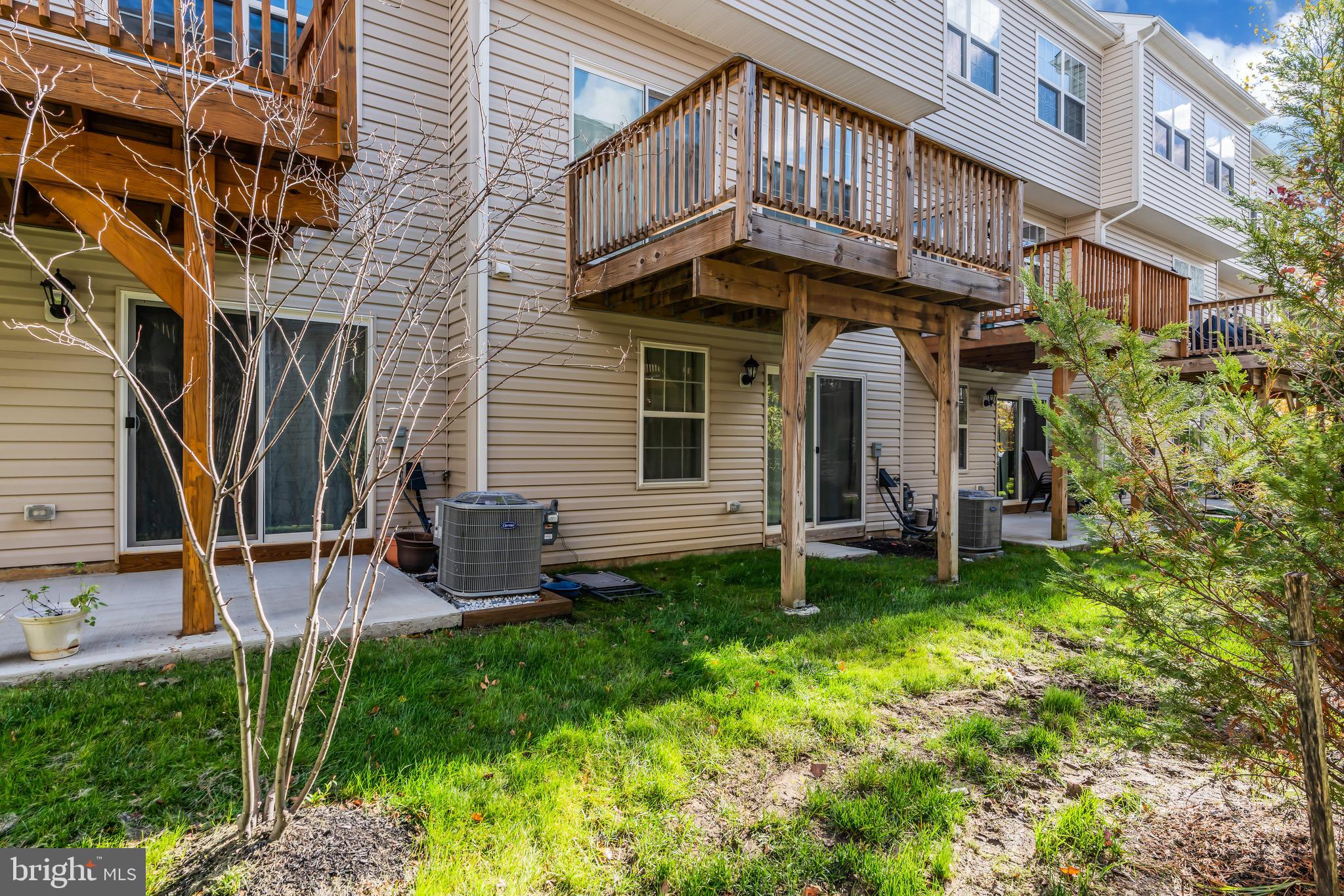 504 East International Road Monroe Township, NJ 08831 - Photo 34 of 37 a view of a house with a yard and sitting area