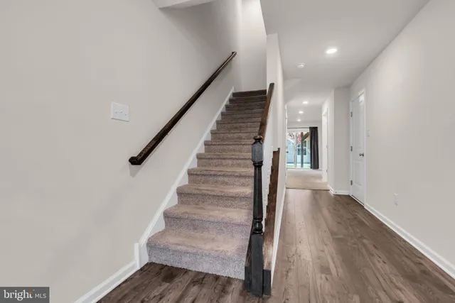 a front view of a building with garden