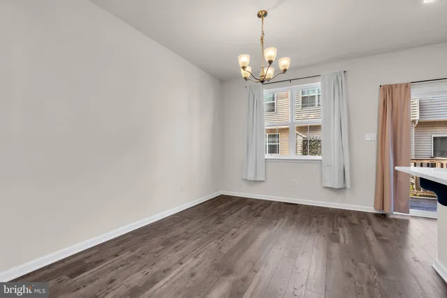 a view of livingroom with hardwood floor and window