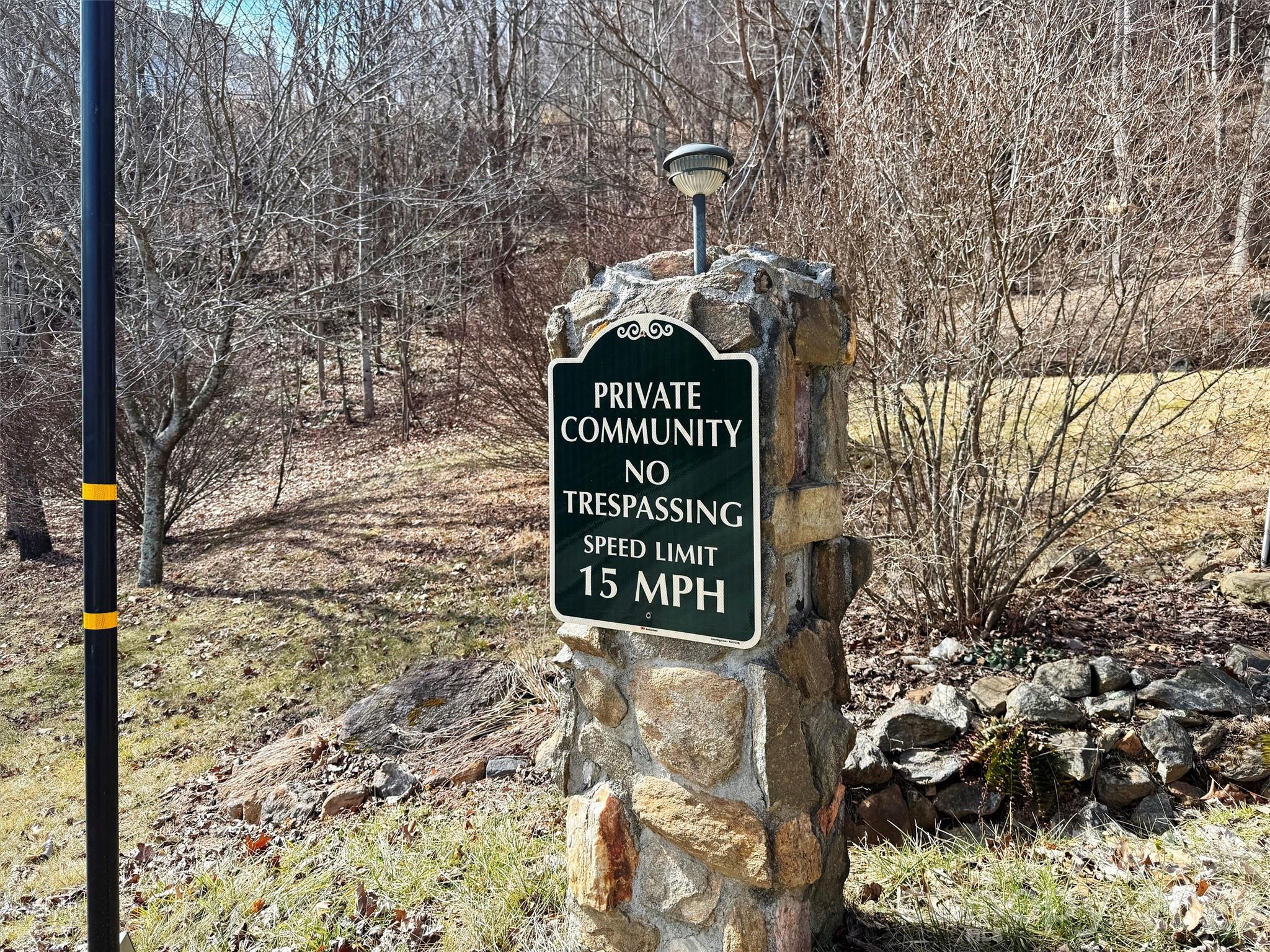 Tbd Rock Brg Road, Unit 9A & 9B Canton, NC 28716 - Photo 29 of 34 a sign that is sitting on a brick wall