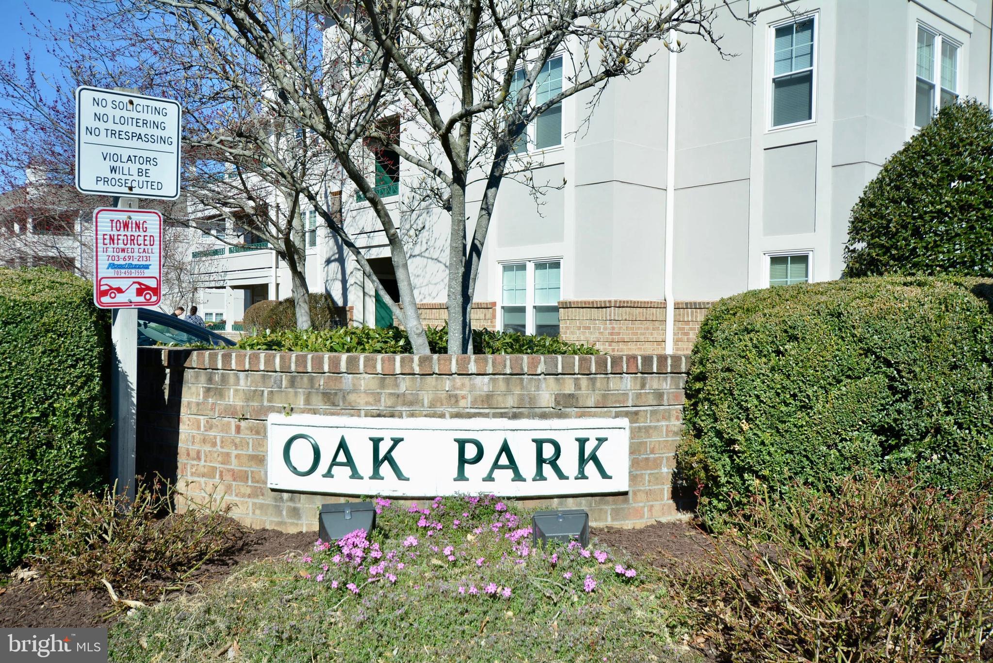 12000 Taliesin Place, Unit 36 Reston, VA 20190 - Photo 2 of 36 a sign that is on a pole