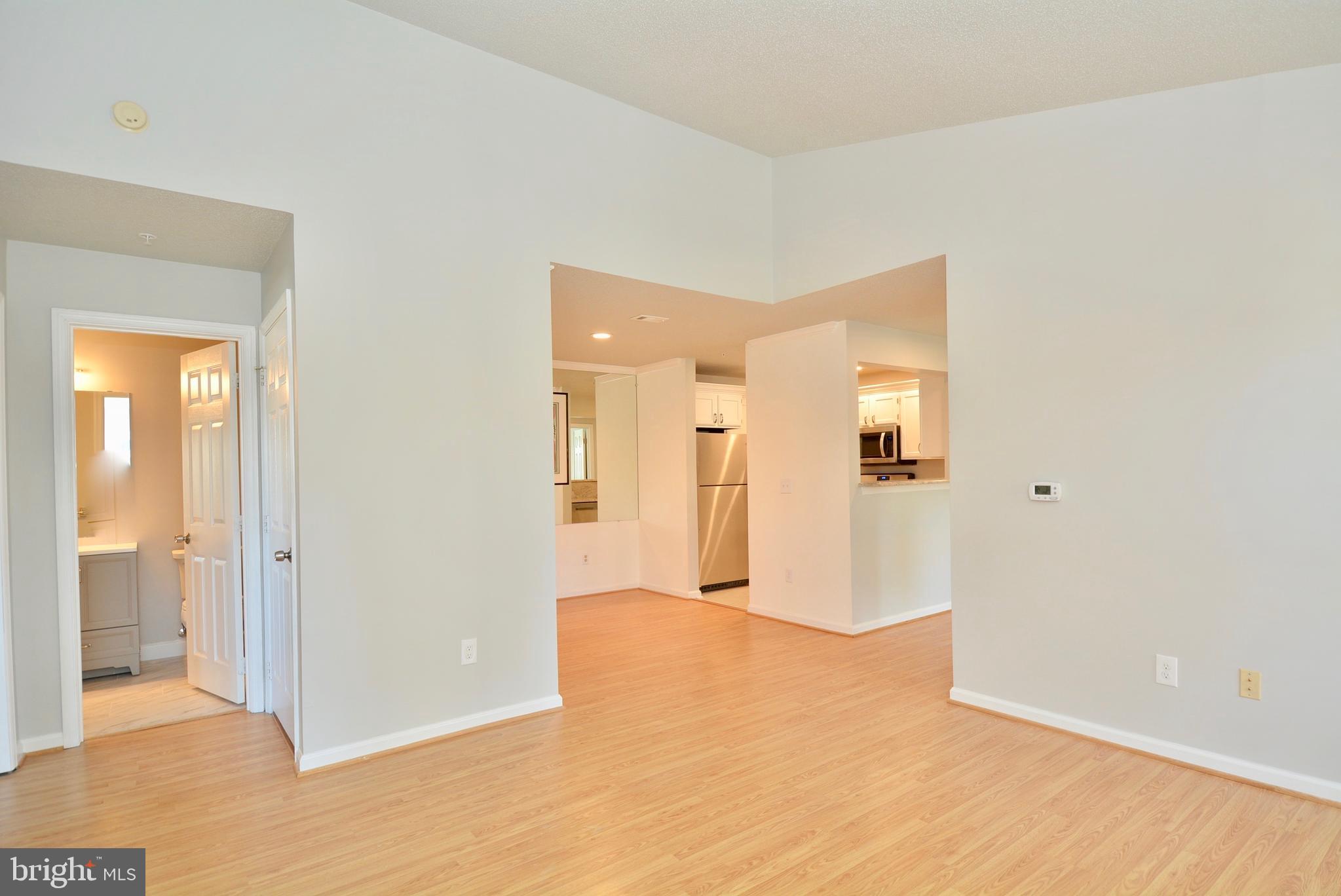 12000 Taliesin Place, Unit 36 Reston, VA 20190 - Photo 13 of 36 a view of a bathroom with wooden floor