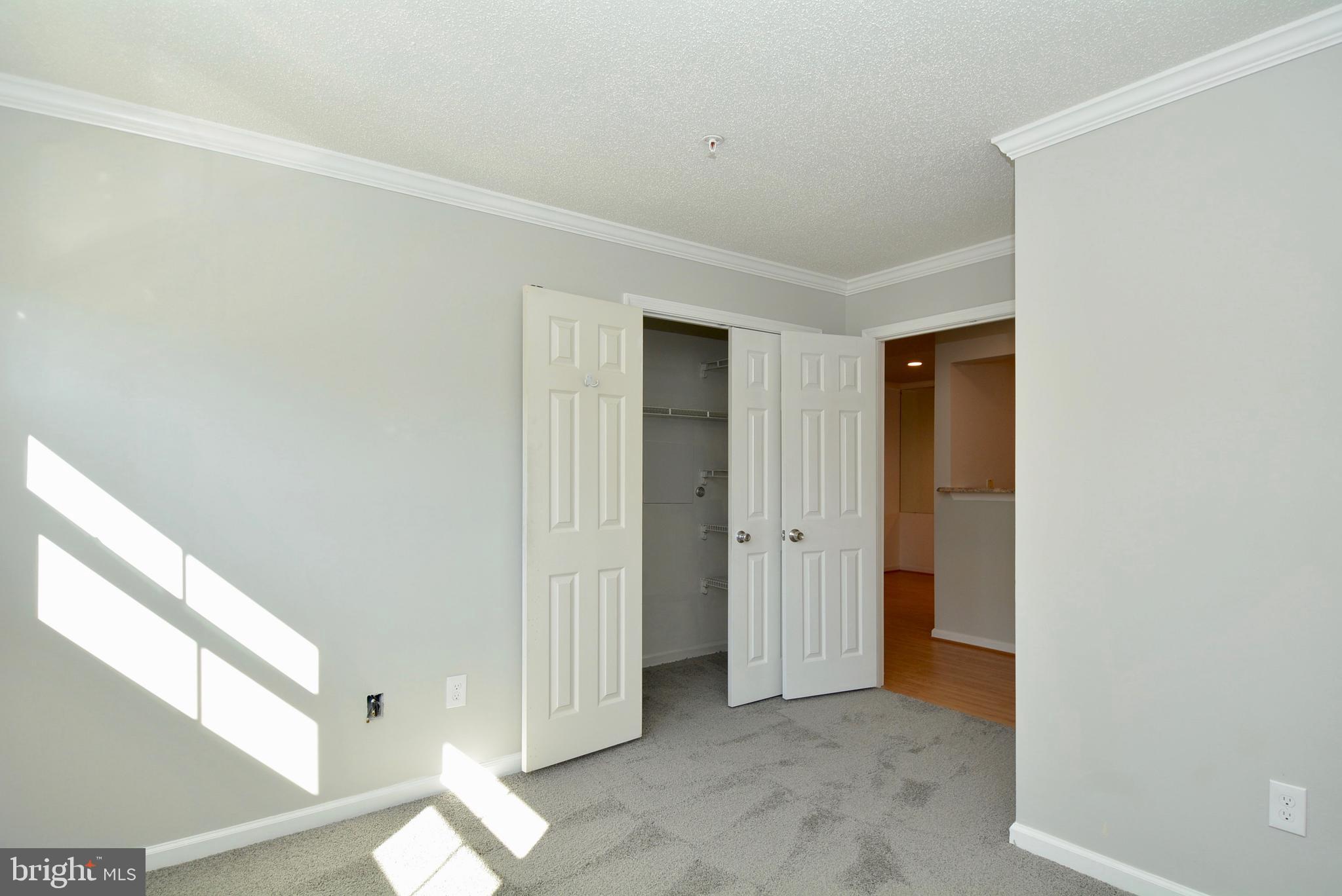 12000 Taliesin Place, Unit 36 Reston, VA 20190 - Photo 18 of 36 a view of a livingroom with an entryway
