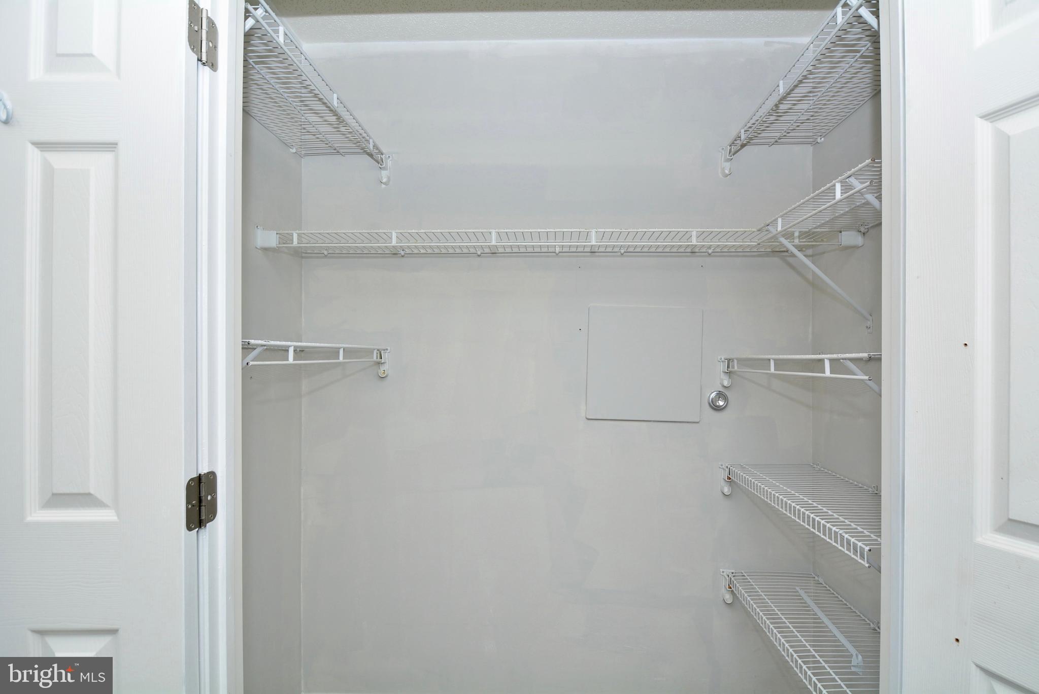 12000 Taliesin Place, Unit 36 Reston, VA 20190 - Photo 19 of 36 a view of small space with racks on the wall