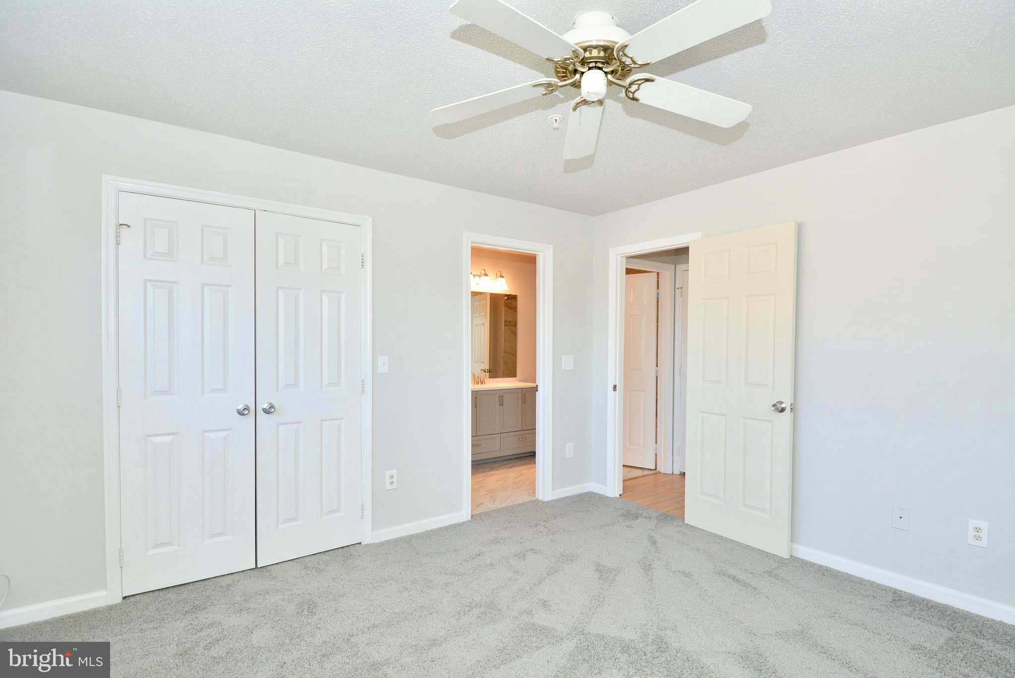 12000 Taliesin Place, Unit 36 Reston, VA 20190 - Photo 21 of 36 a view of a big room with chandelier fan