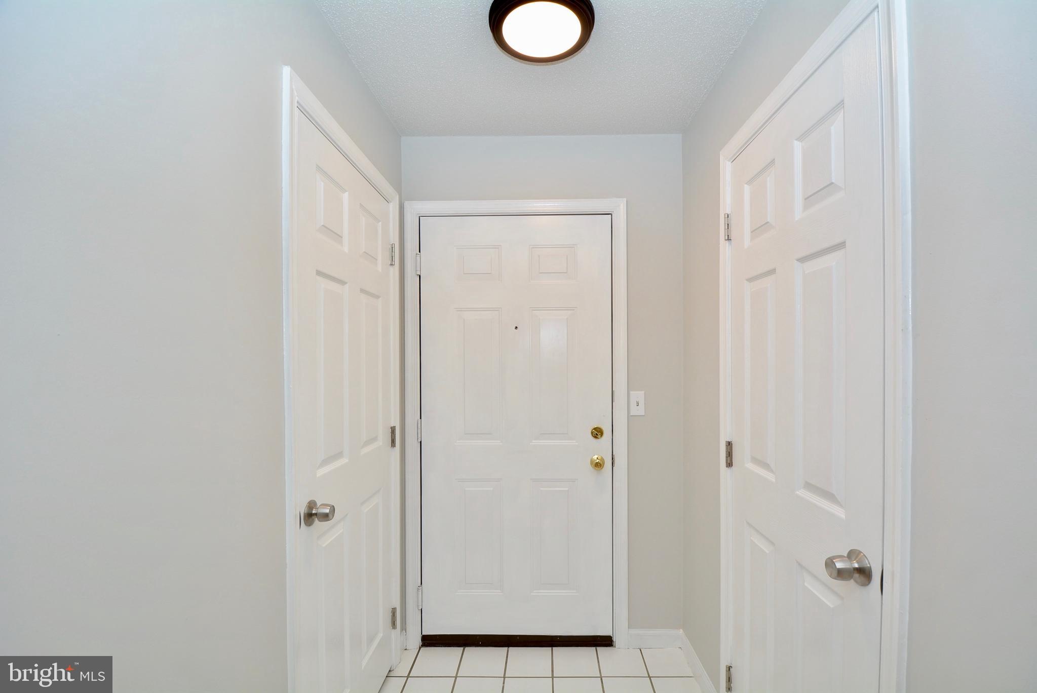12000 Taliesin Place, Unit 36 Reston, VA 20190 - Photo 4 of 36 a view of a bathroom with a shower
