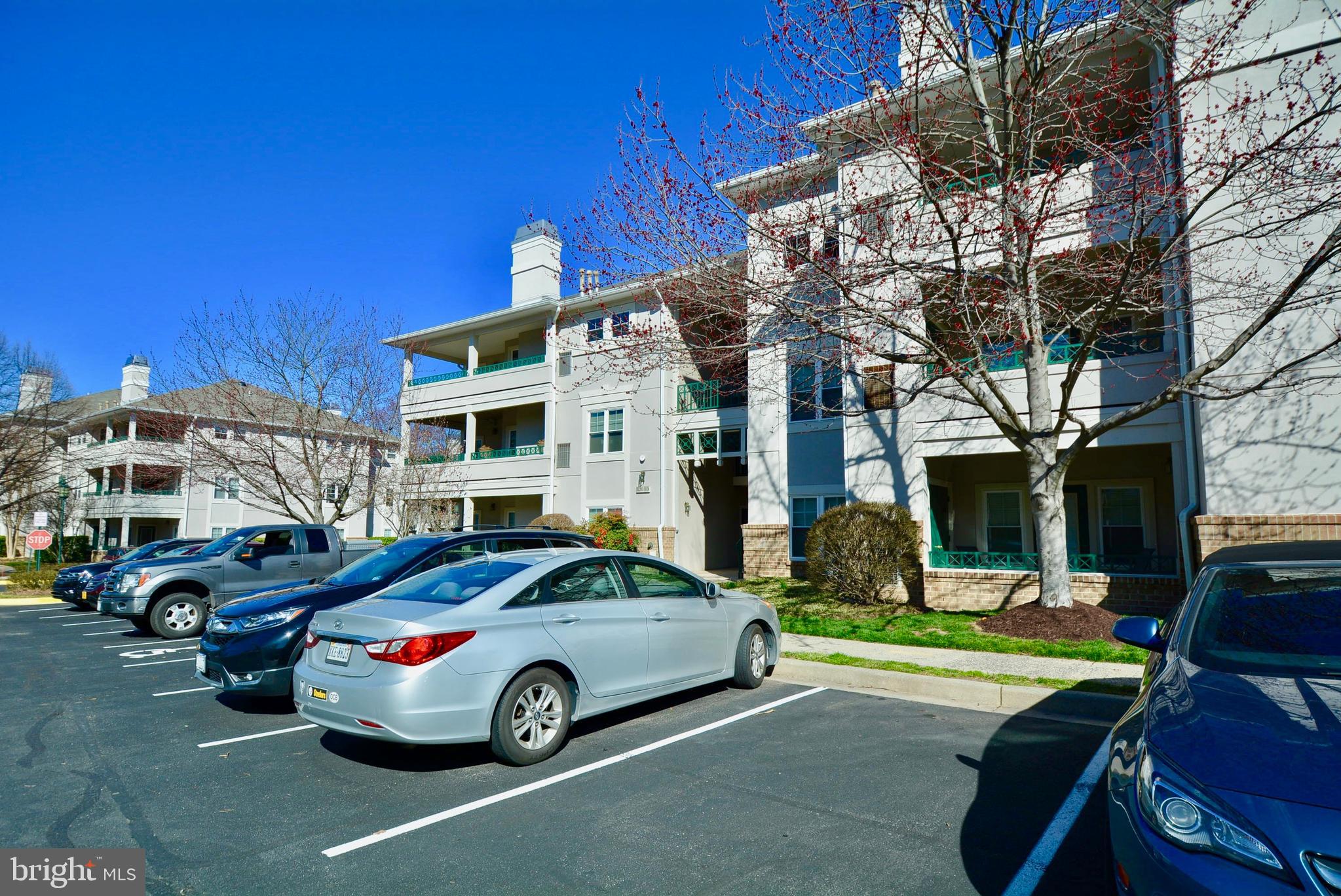 12000 Taliesin Place, Unit 36 Reston, VA 20190 - Photo 35 of 36 a car parked in front of a building