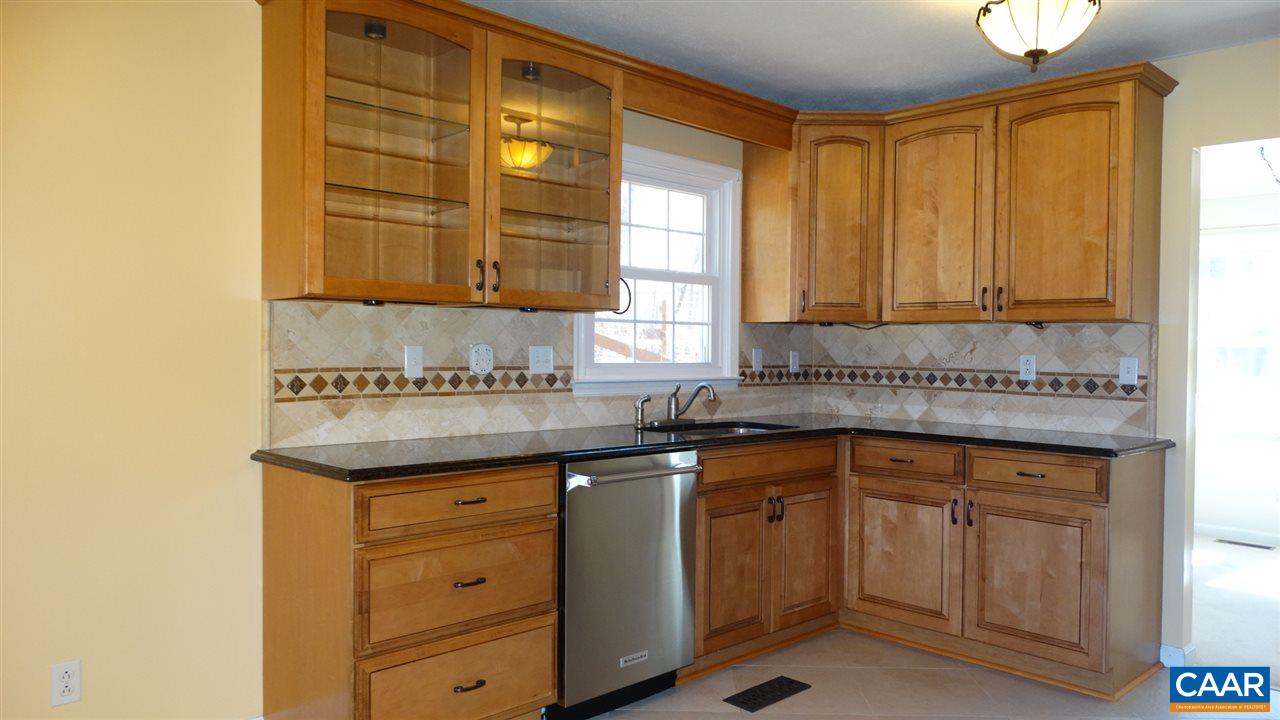 105 Old Farm Road Ruckersville, VA 22968 - Photo 7 of 34 a kitchen with a sink and cabinets