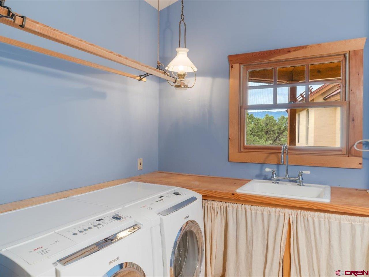 622 Bristlecone Drive Ridgway, CO 81432 - Photo 15 of 35 a utility room with dryer and washer