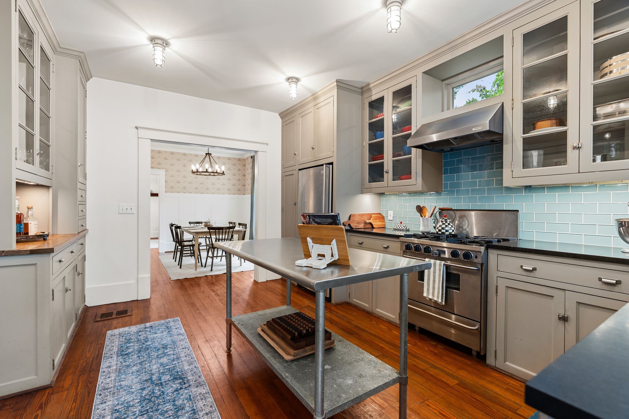 3012 Beauchamp Street Houston, TX 77009 - Photo 13 of 43 a kitchen with stainless steel appliances granite countertop a stove and a sink