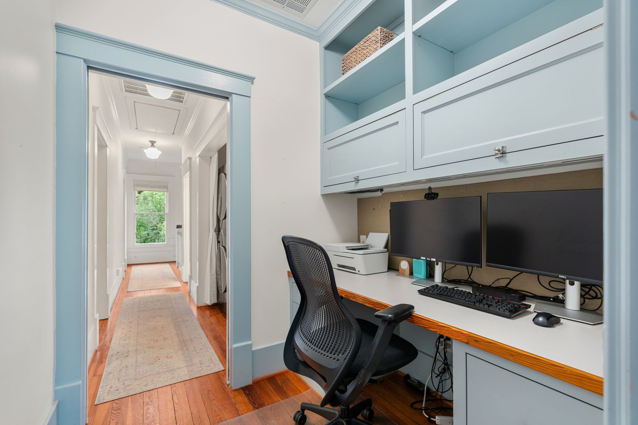 3012 Beauchamp Street Houston, TX 77009 - Photo 20 of 43 a view of a workspace with furniture and a window