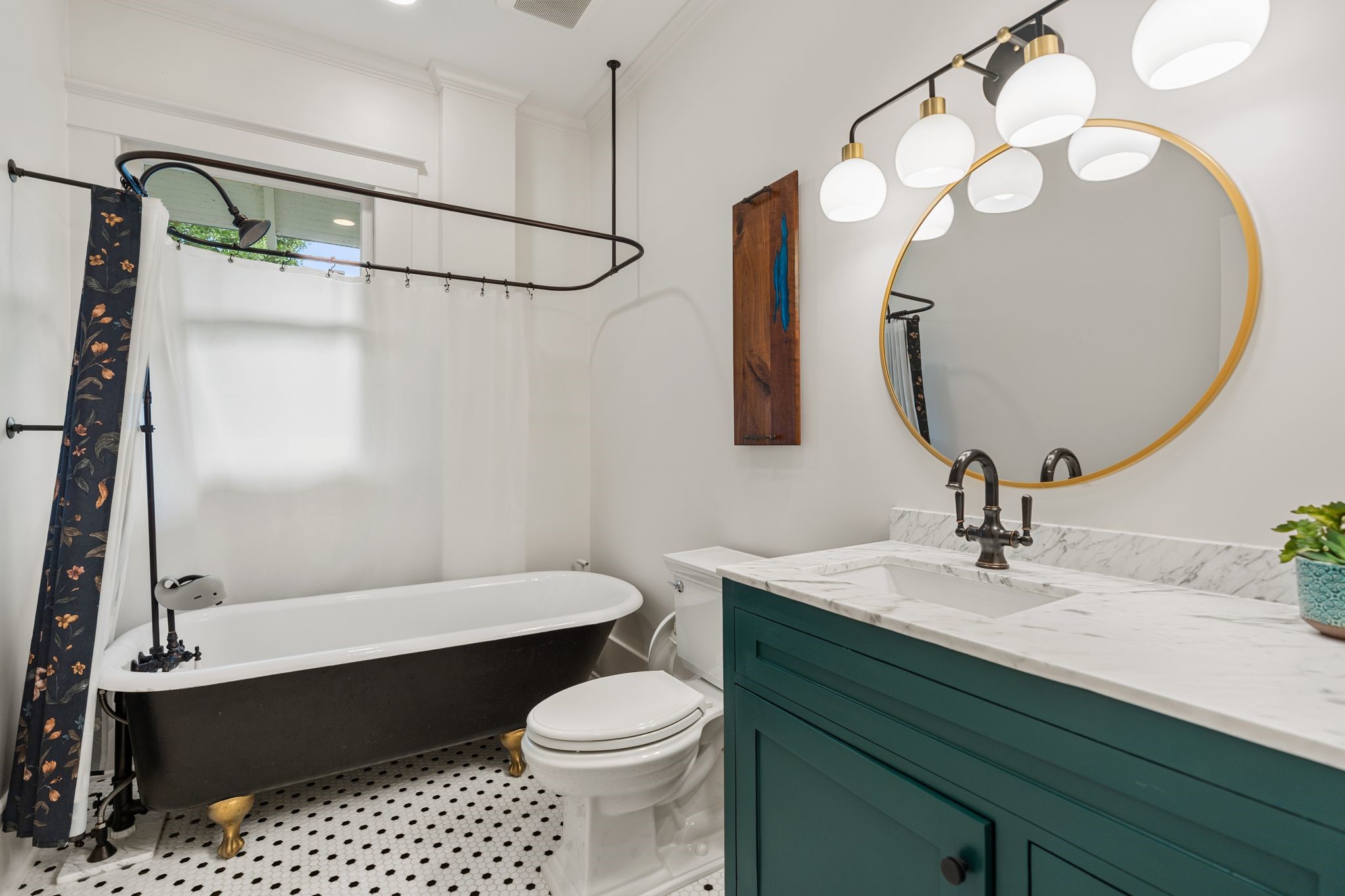3012 Beauchamp Street Houston, TX 77009 - Photo 22 of 43 a bathroom with a sink mirror vanity and toilet