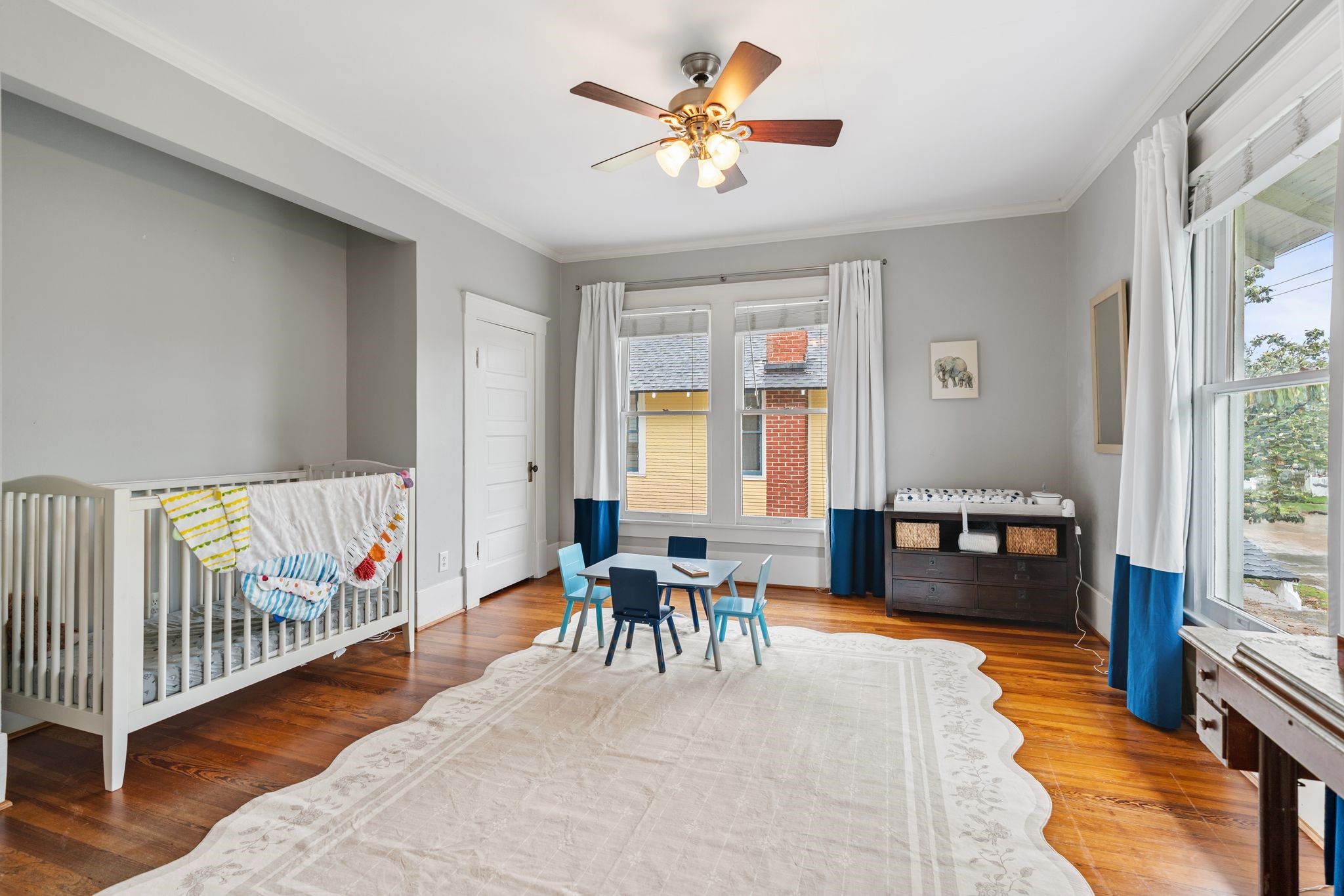 3012 Beauchamp Street Houston, TX 77009 - Photo 23 of 43 a bedroom with furniture and a large window