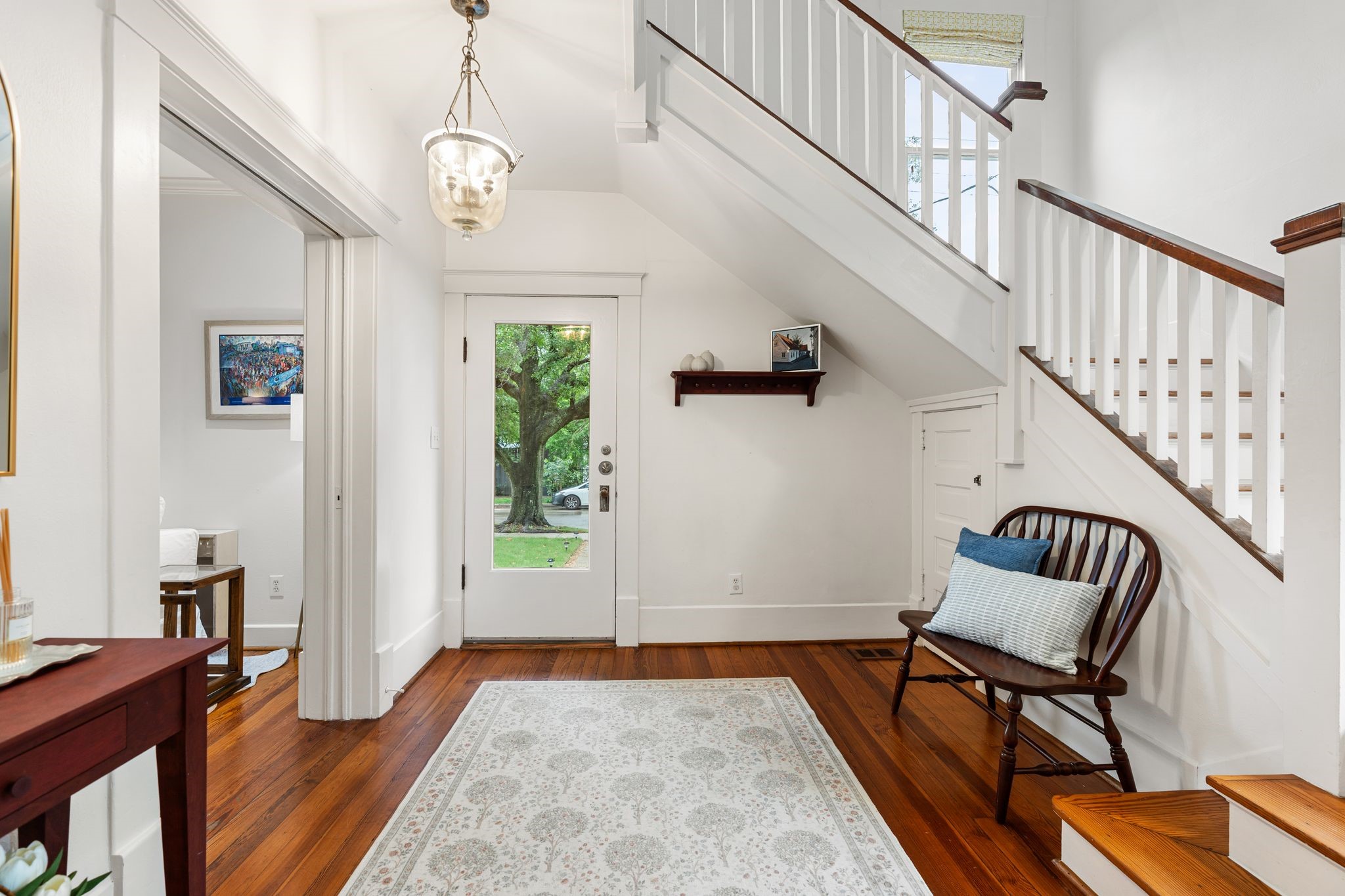 3012 Beauchamp Street Houston, TX 77009 - Photo 3 of 43 a view of a hallway with wooden floor and windows
