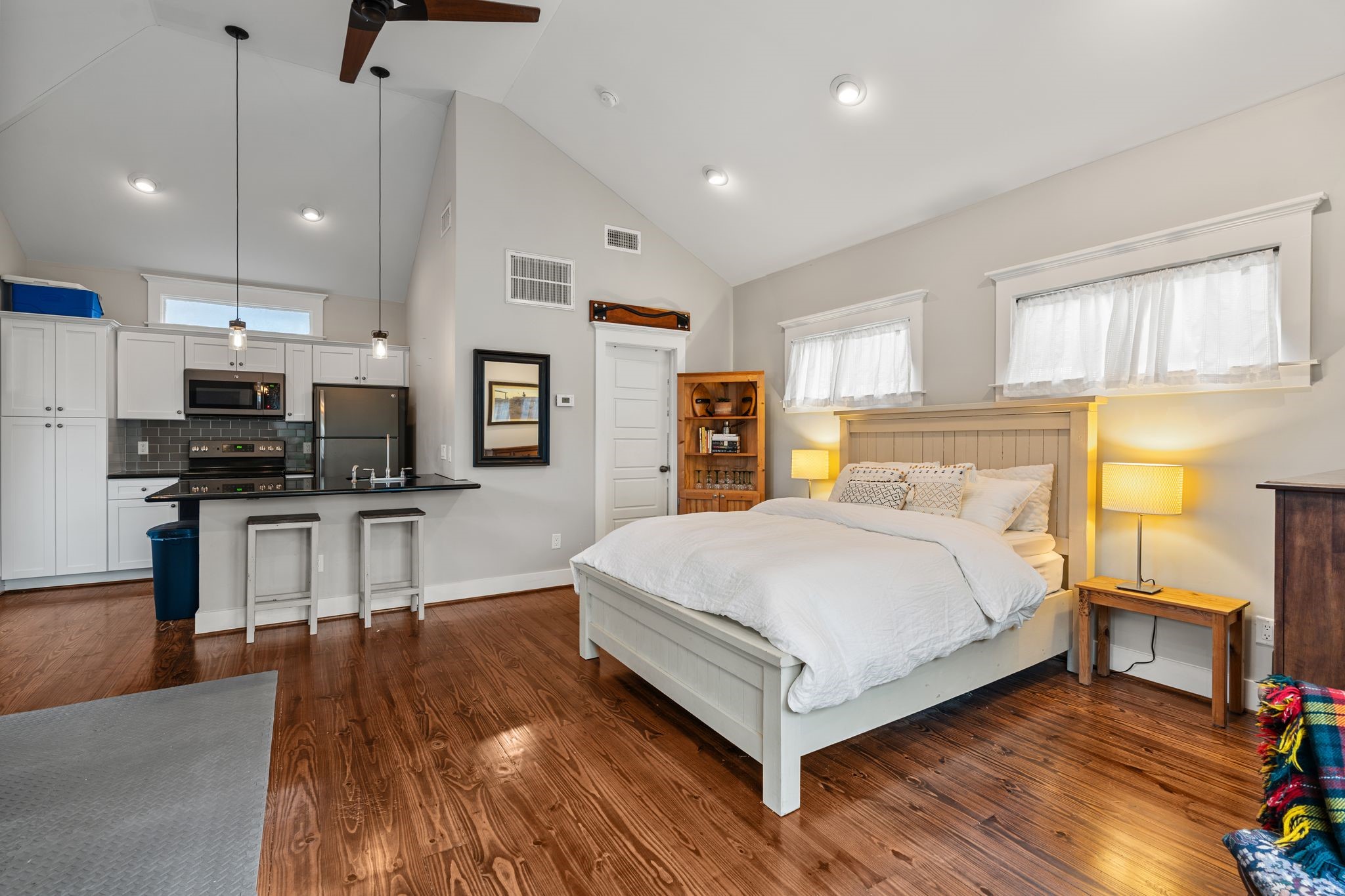 3012 Beauchamp Street Houston, TX 77009 - Photo 33 of 43 a spacious bedroom with a bed and a flat screen tv