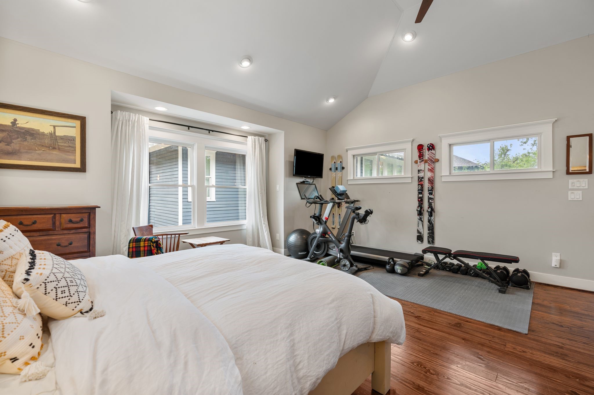 3012 Beauchamp Street Houston, TX 77009 - Photo 35 of 43 a bedroom with a bed and wooden floor