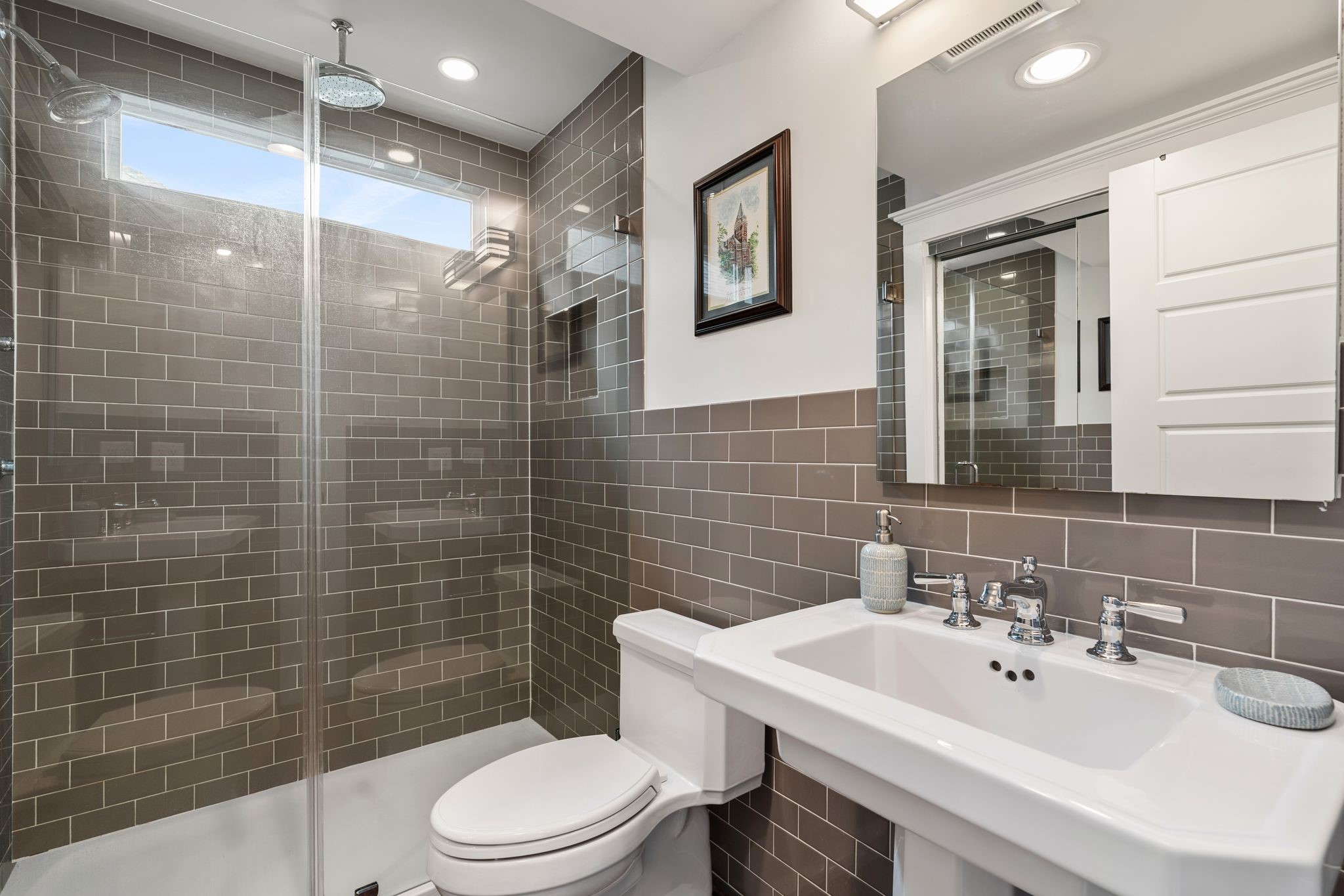 3012 Beauchamp Street Houston, TX 77009 - Photo 36 of 43 a bathroom with a sink mirror toilet and shower