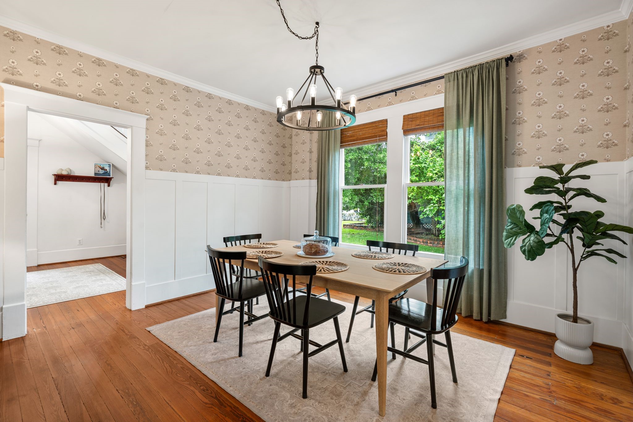 3012 Beauchamp Street Houston, TX 77009 - Photo 8 of 43 a view of a dining room with furniture window and wooden floor