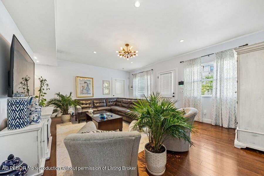 310 Almeria Road West Palm Beach, FL 33405 - Photo 6 of 71 06_310AlmeriaRd_1_LivingRoom_Small