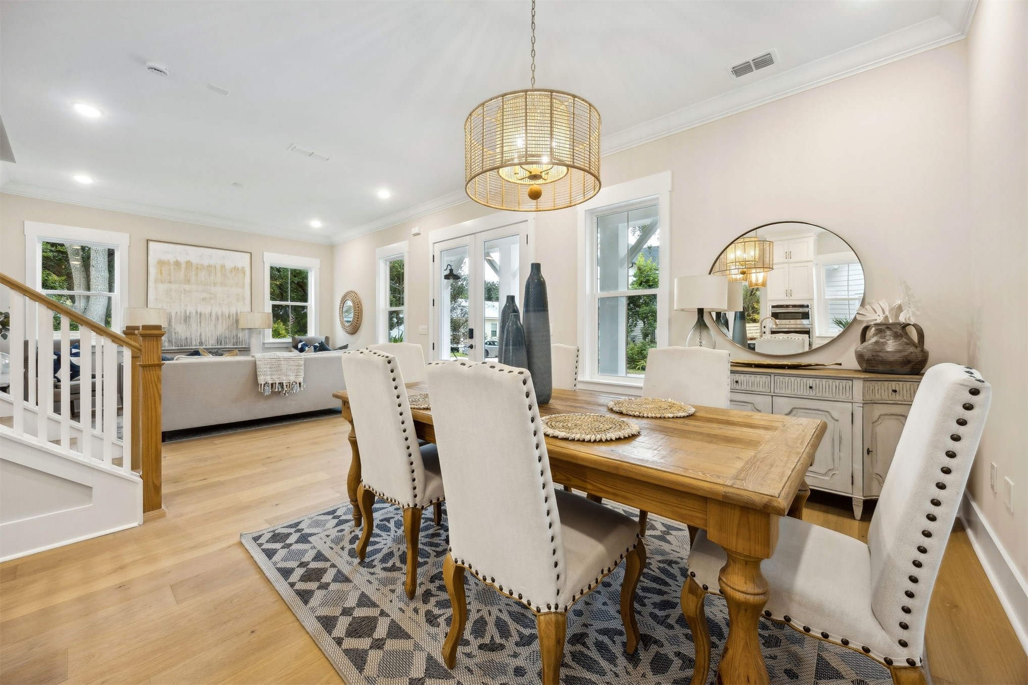 1111 White Street Fernandina Beach, FL 32034 - Photo 13 of 82 a view of a dining room with furniture and a chandelier