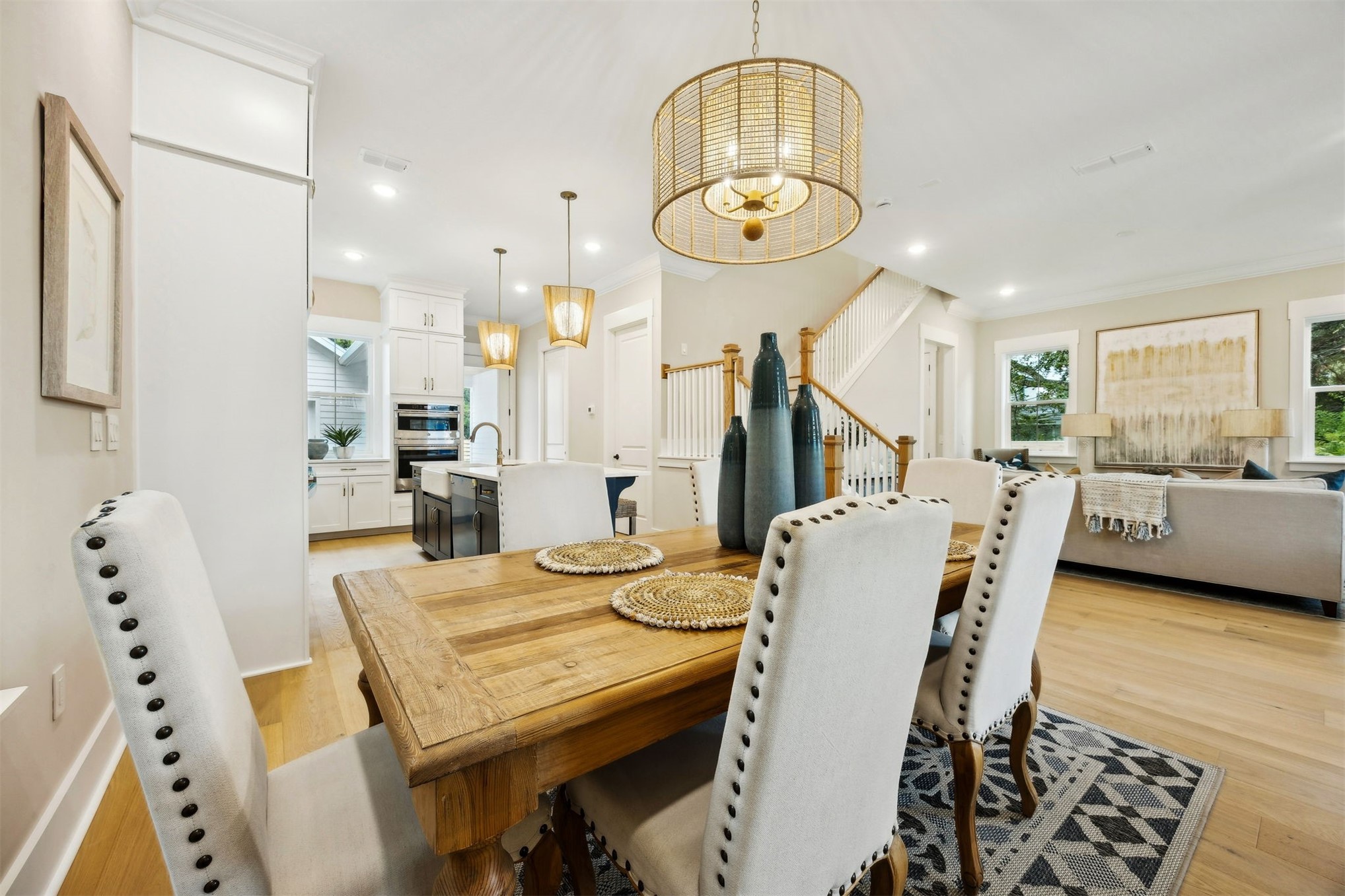 1111 White Street Fernandina Beach, FL 32034 - Photo 14 of 82 a view of a dining room with furniture and a chandelier