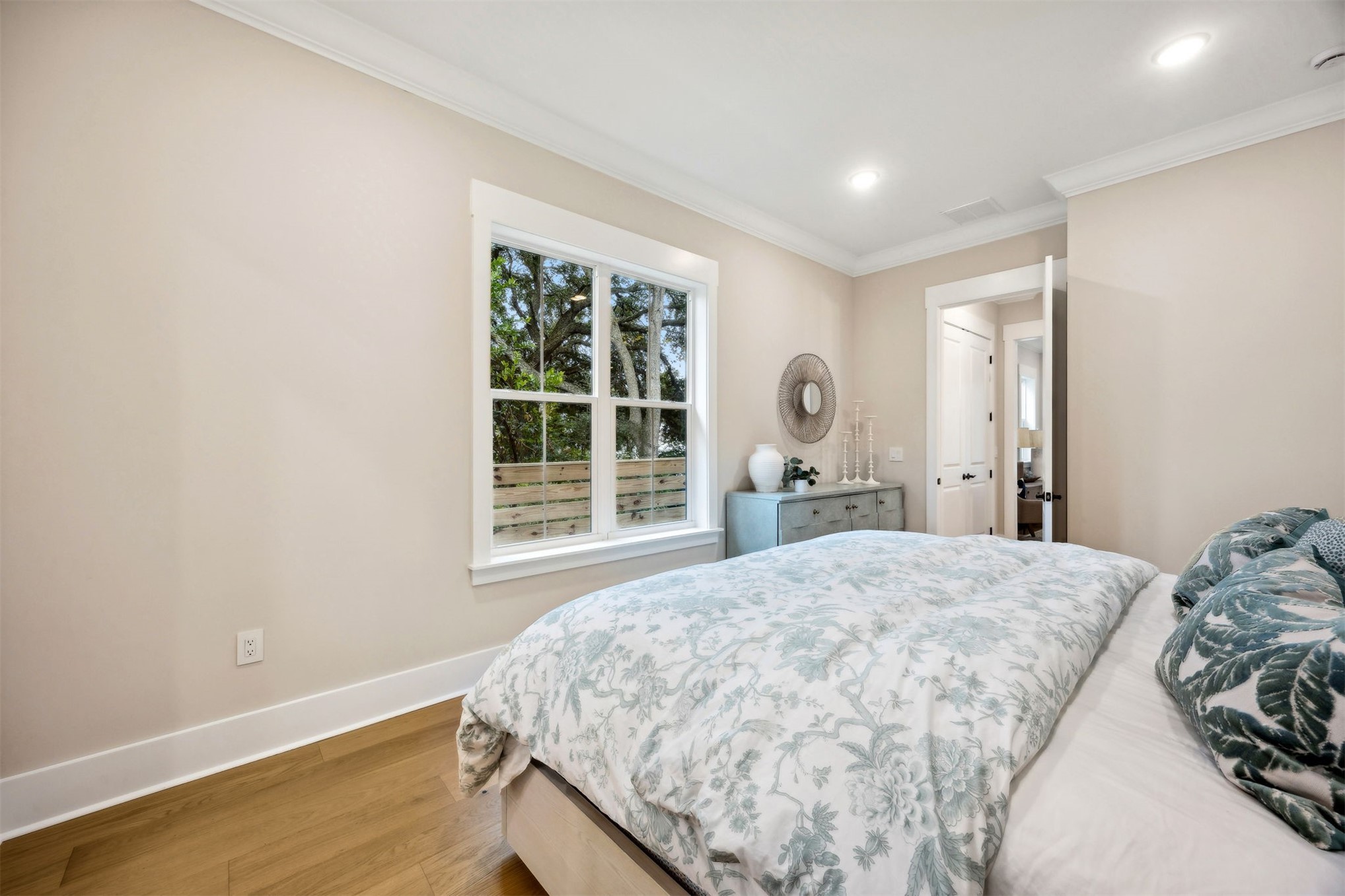 1111 White Street Fernandina Beach, FL 32034 - Photo 24 of 82 a bedroom with a bed and a window