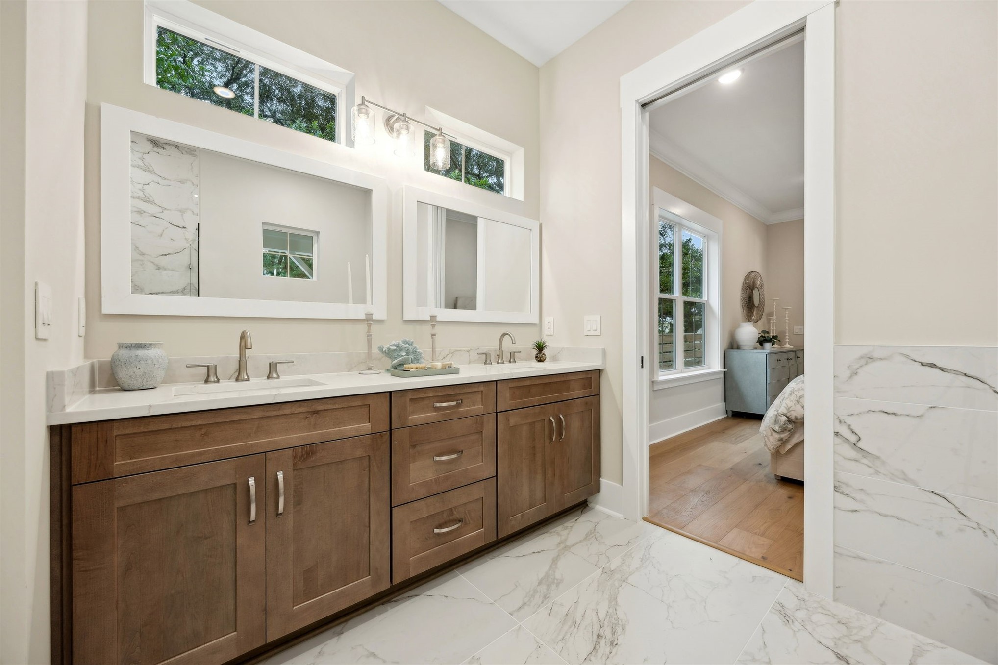 1111 White Street Fernandina Beach, FL 32034 - Photo 30 of 82 a spacious bathroom with a granite countertop sink and a mirror