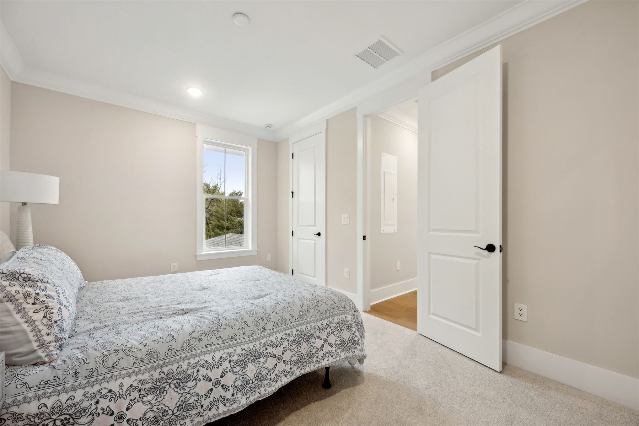 1111 White Street Fernandina Beach, FL 32034 - Photo 41 of 82 a bedroom with a bed and a window