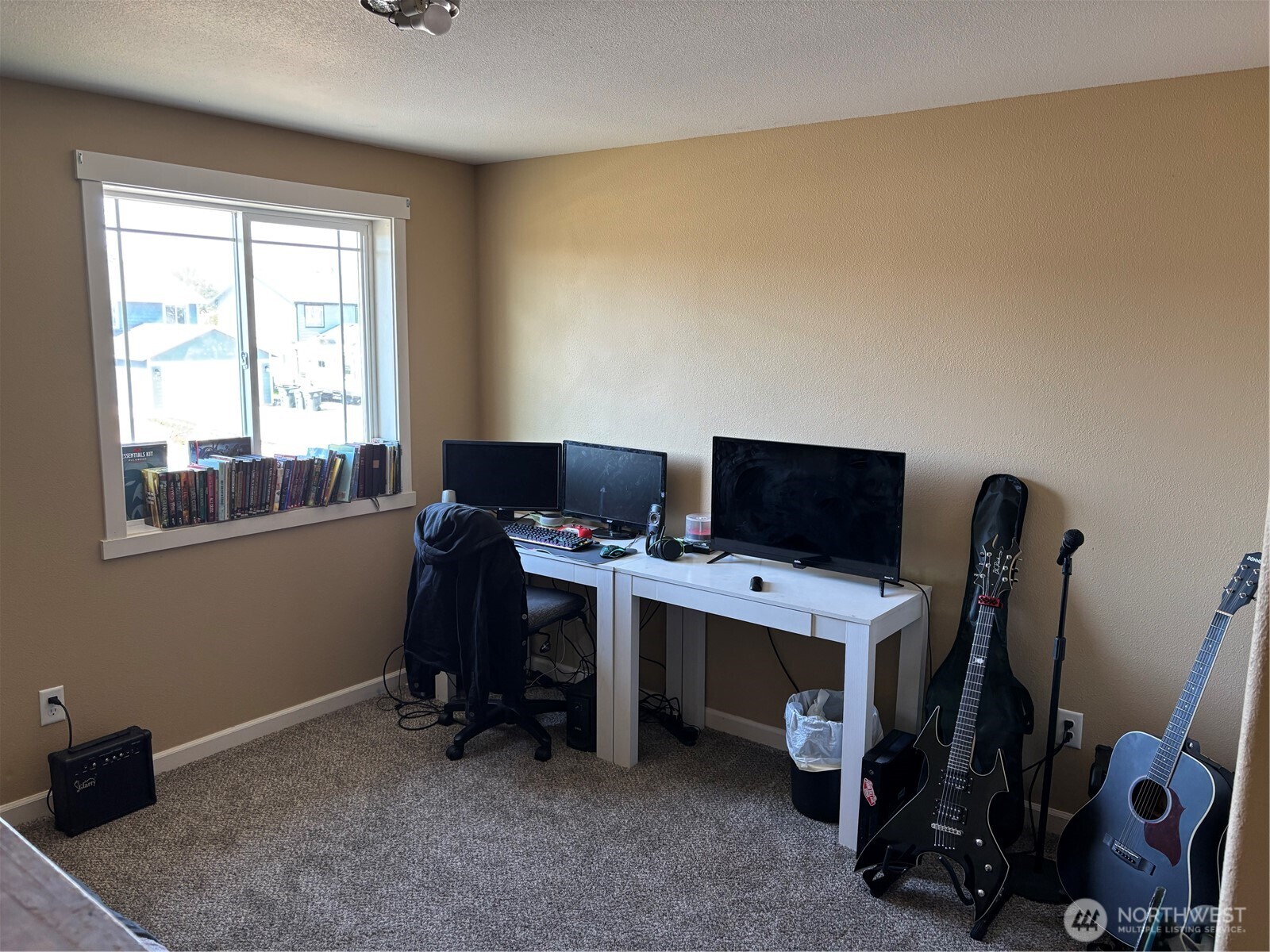 909 Polo Ridge Moses Lake, WA 98837 - Photo 11 of 27 a view of a workspace with furniture and a window
